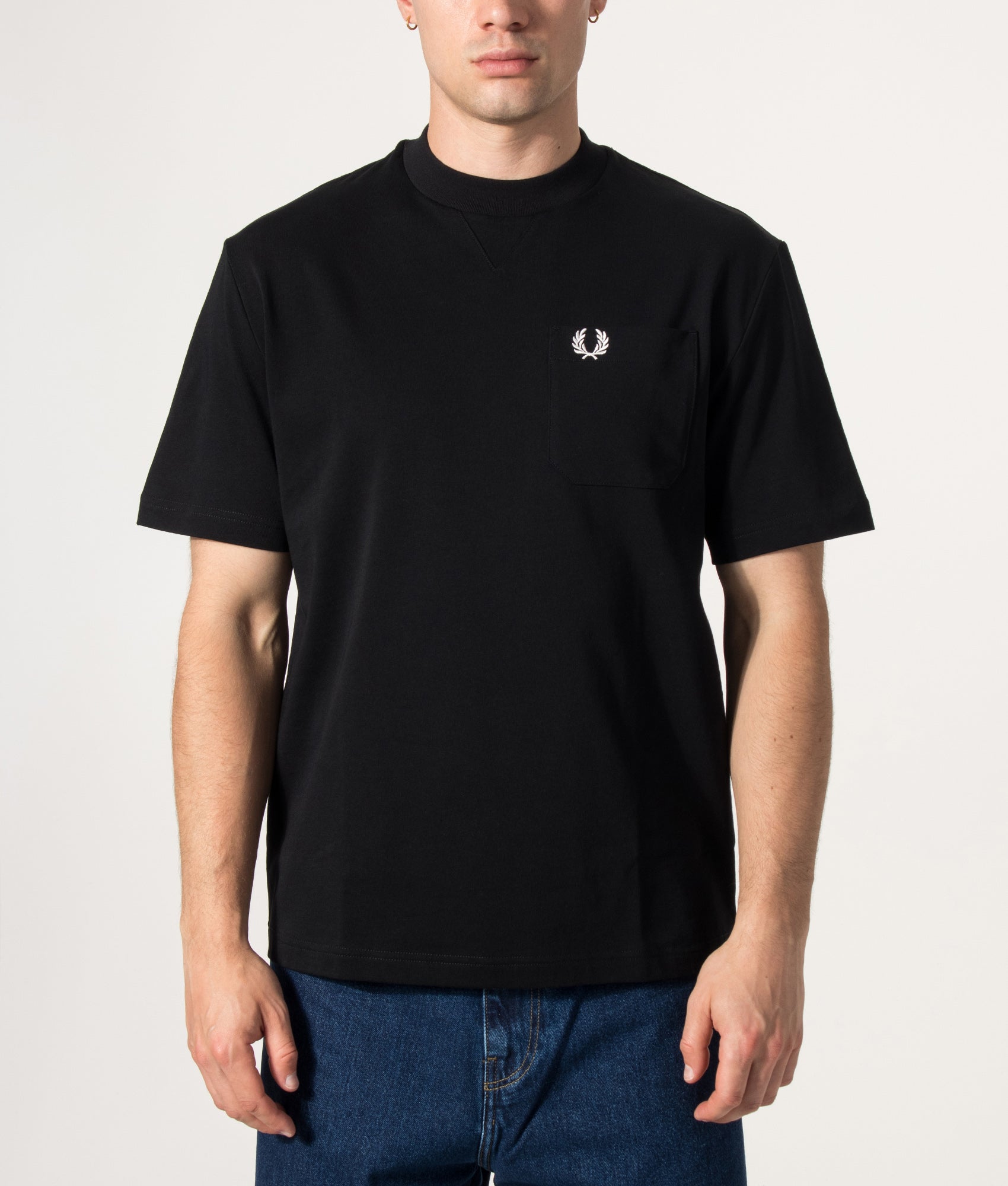 Fred Perry Pocket Detail T-Shirt in Black at EQVVS Menswear. Model front shot.