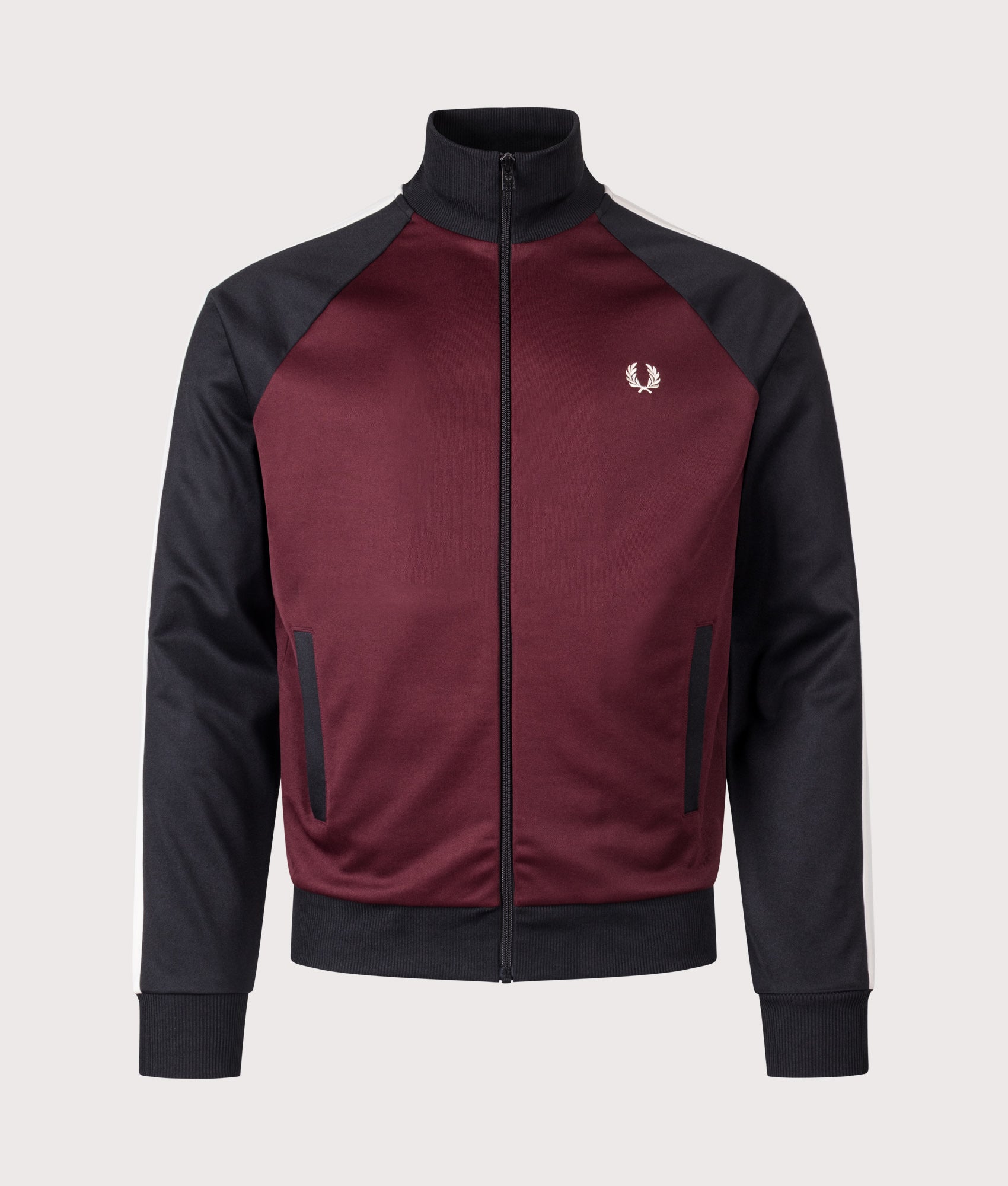 Fred Perry Contrast Sleeve Track Jacket in Oxblood at EQVVS Menswear. Front shot.