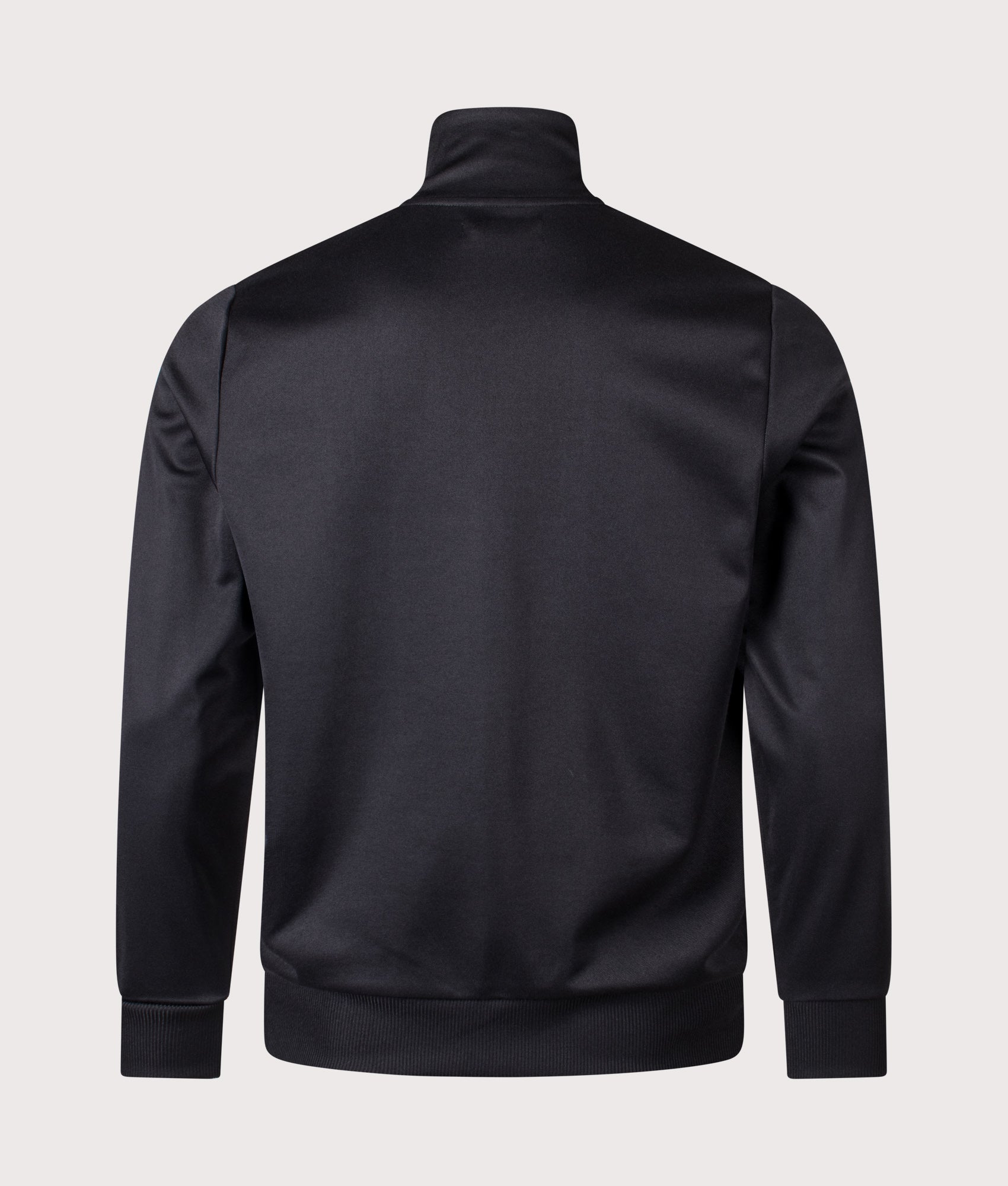 Fred Perry Stripe Tape Track Jacket in Black and Champagne at EQVVS Menswear. Back shot.