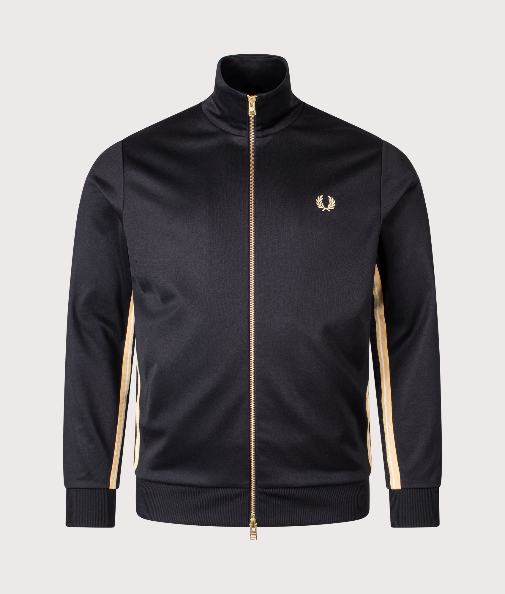 Fred Perry Stripe Tape Track Jacket in Black and Champagne at EQVVS Menswear. Front shot.