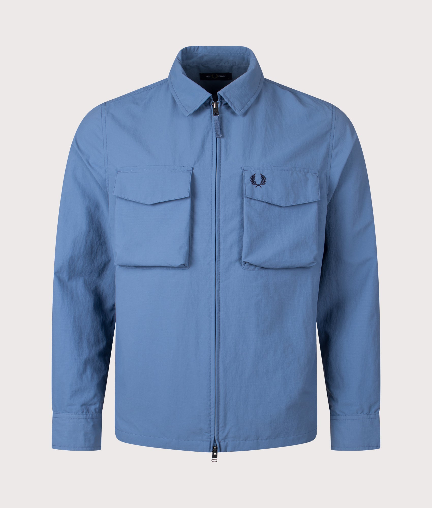 Fred Perry Ripstop Pocket Overshirt in Ace Blue at EQVVS Menswear. Front shot.