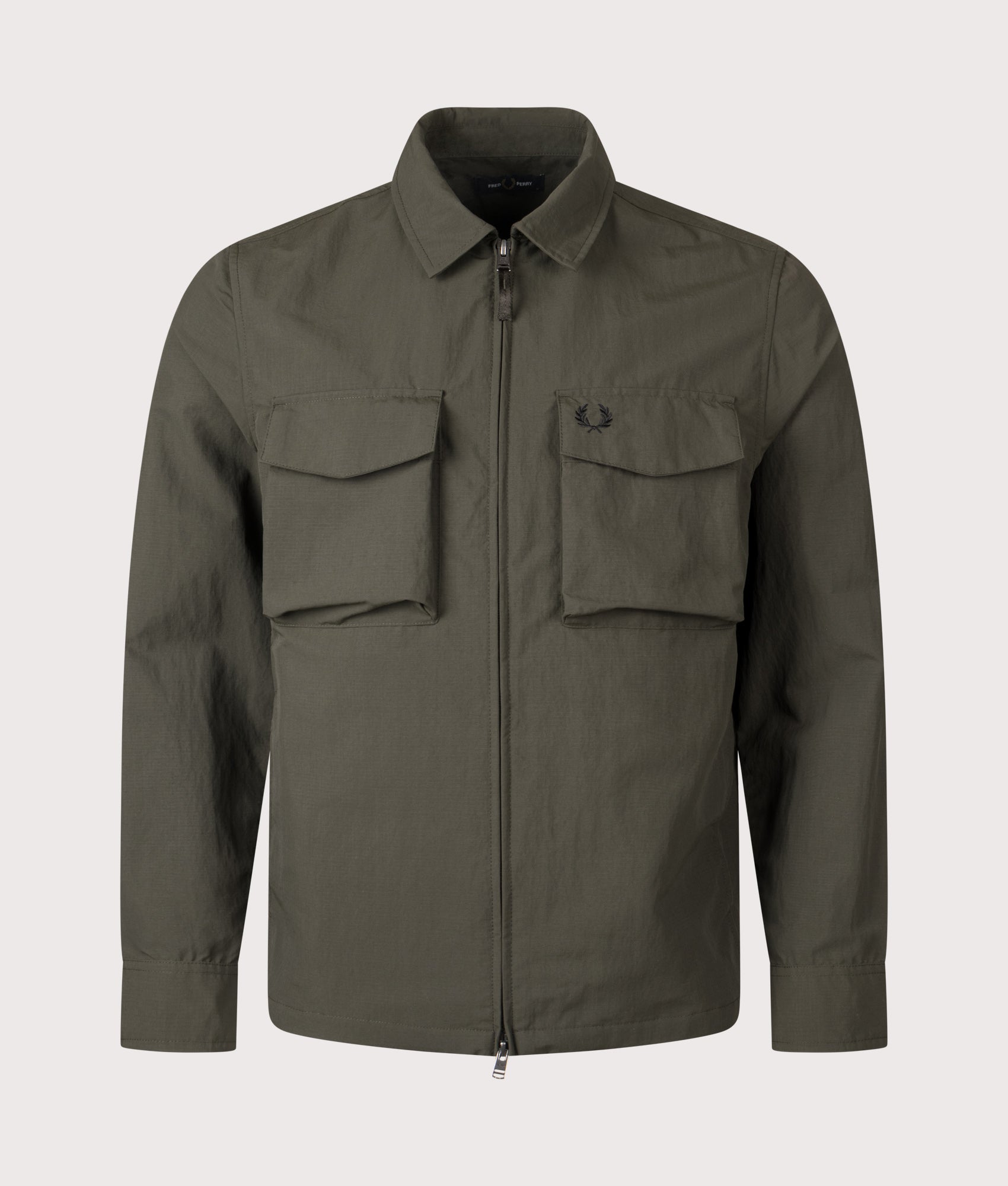 Fred Perry Ripstop Pocket Overshirt in Hunting Green at EQVVS Menswear. Front shot.