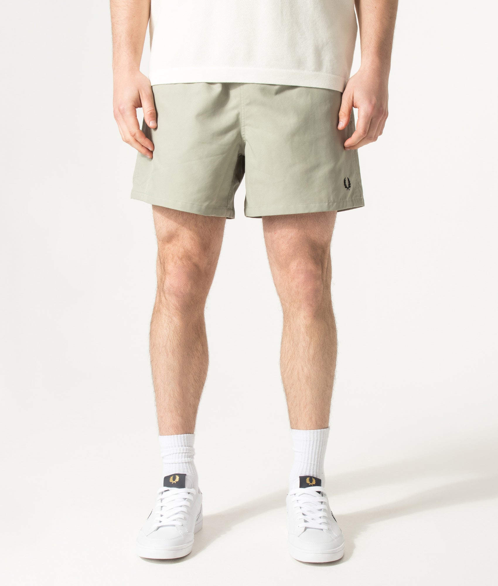 Fred Perry Swimshorts in Seagrass at EQVVS Menswear. Model front shot.