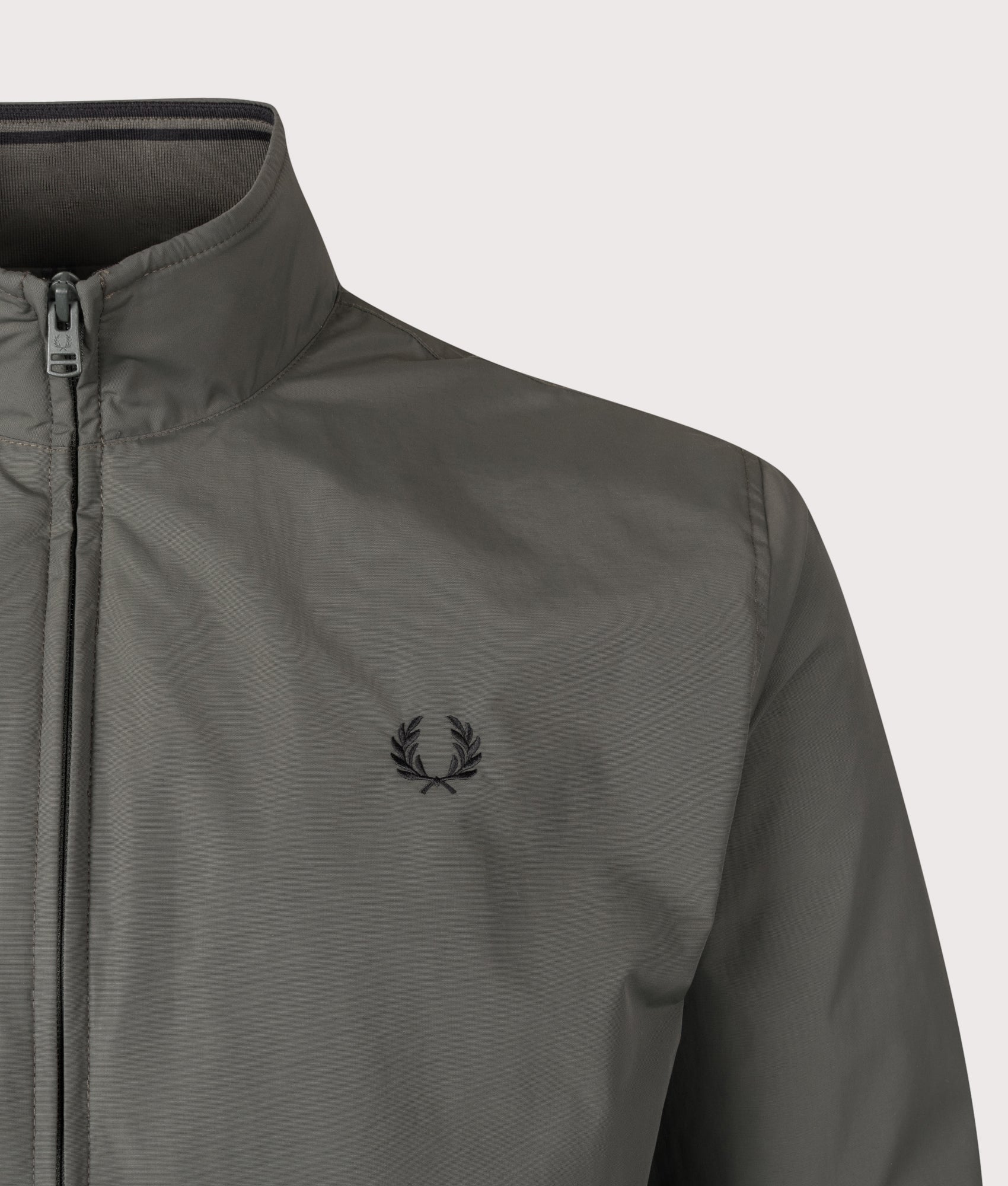 Fred Perry Brentham Jacket in Field Green and Black at EQVVS Menswear. Detail shot.