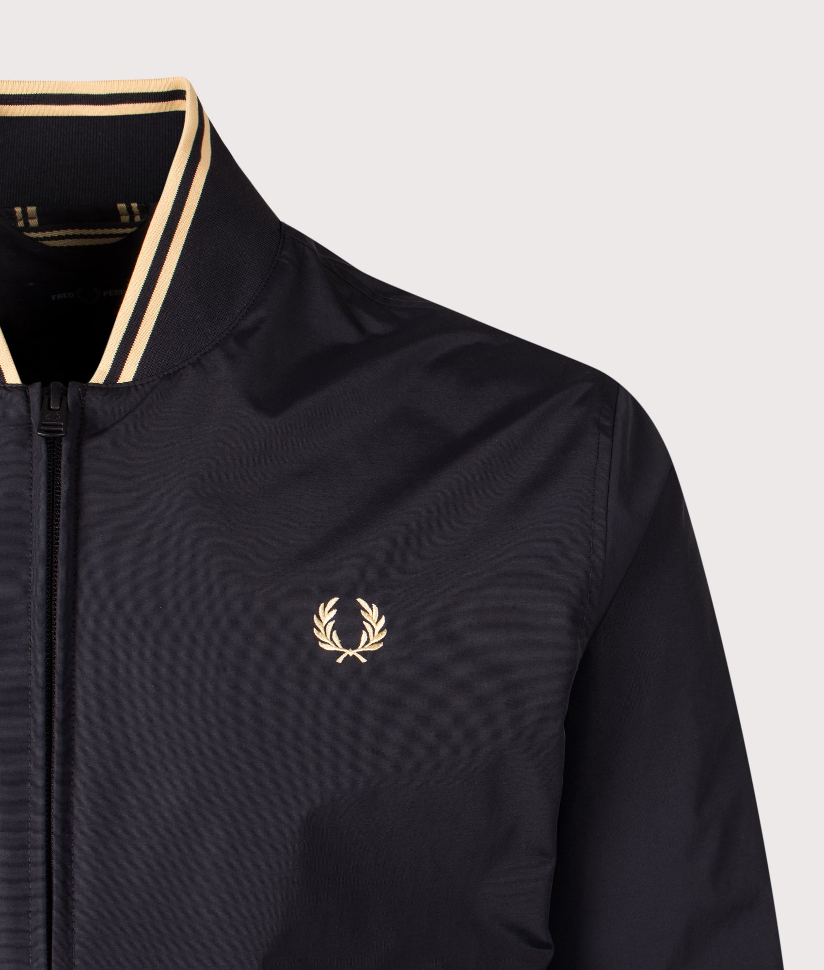 Fred Perry Brentham bomber in Black at EQVVS Menswear. Detail shot.