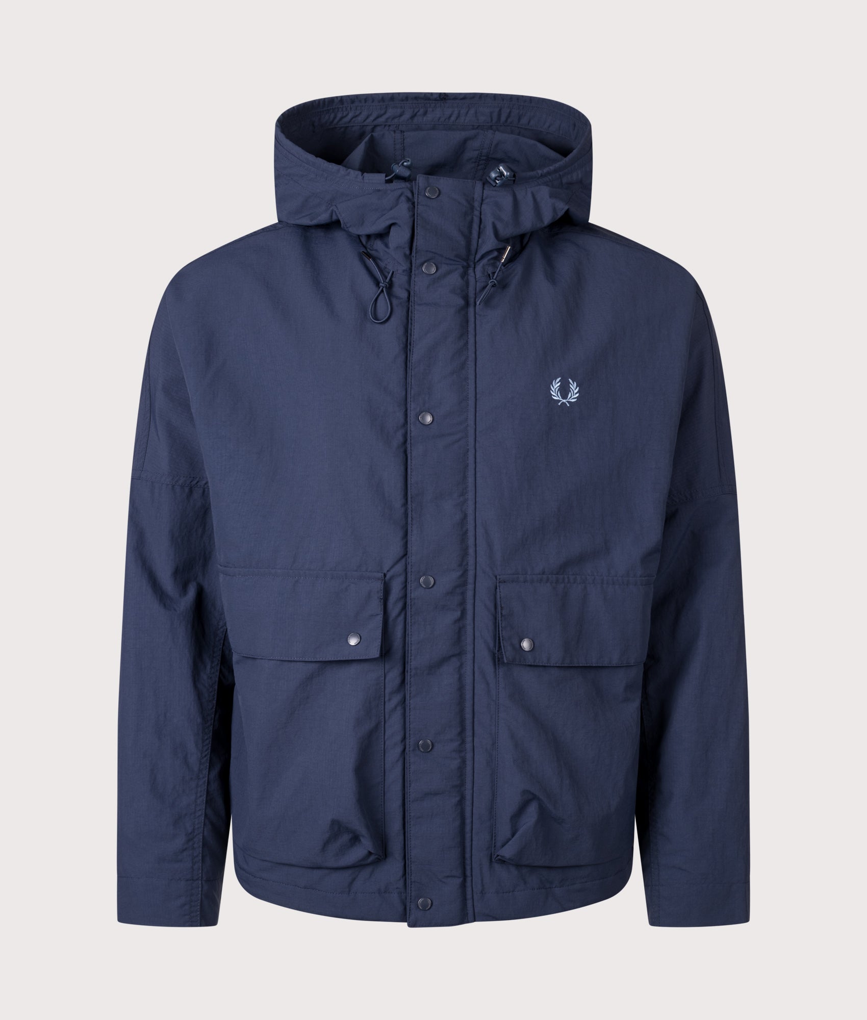 Fred Perry Cropped Ripstop Parka in Tennis Blue at EQVVS Menswear. Front shot.