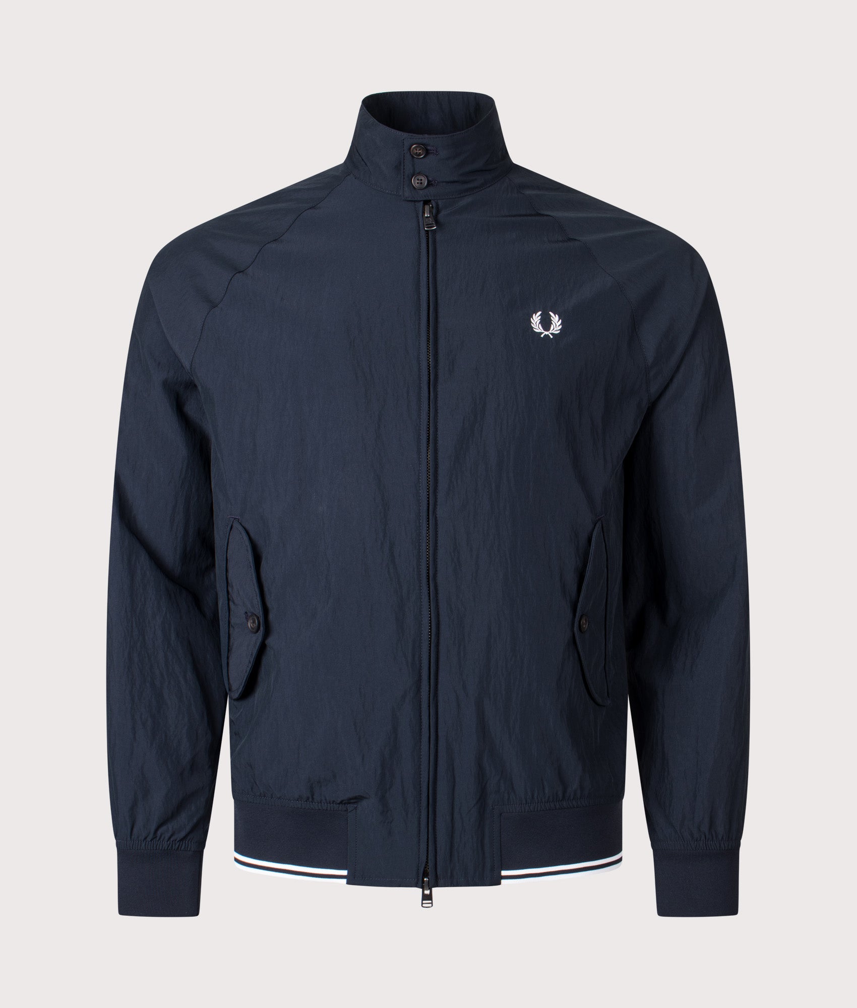 Fred Perry Crinkle Harrington Jacket in Navy at EQVVS Menswear. Front shot.