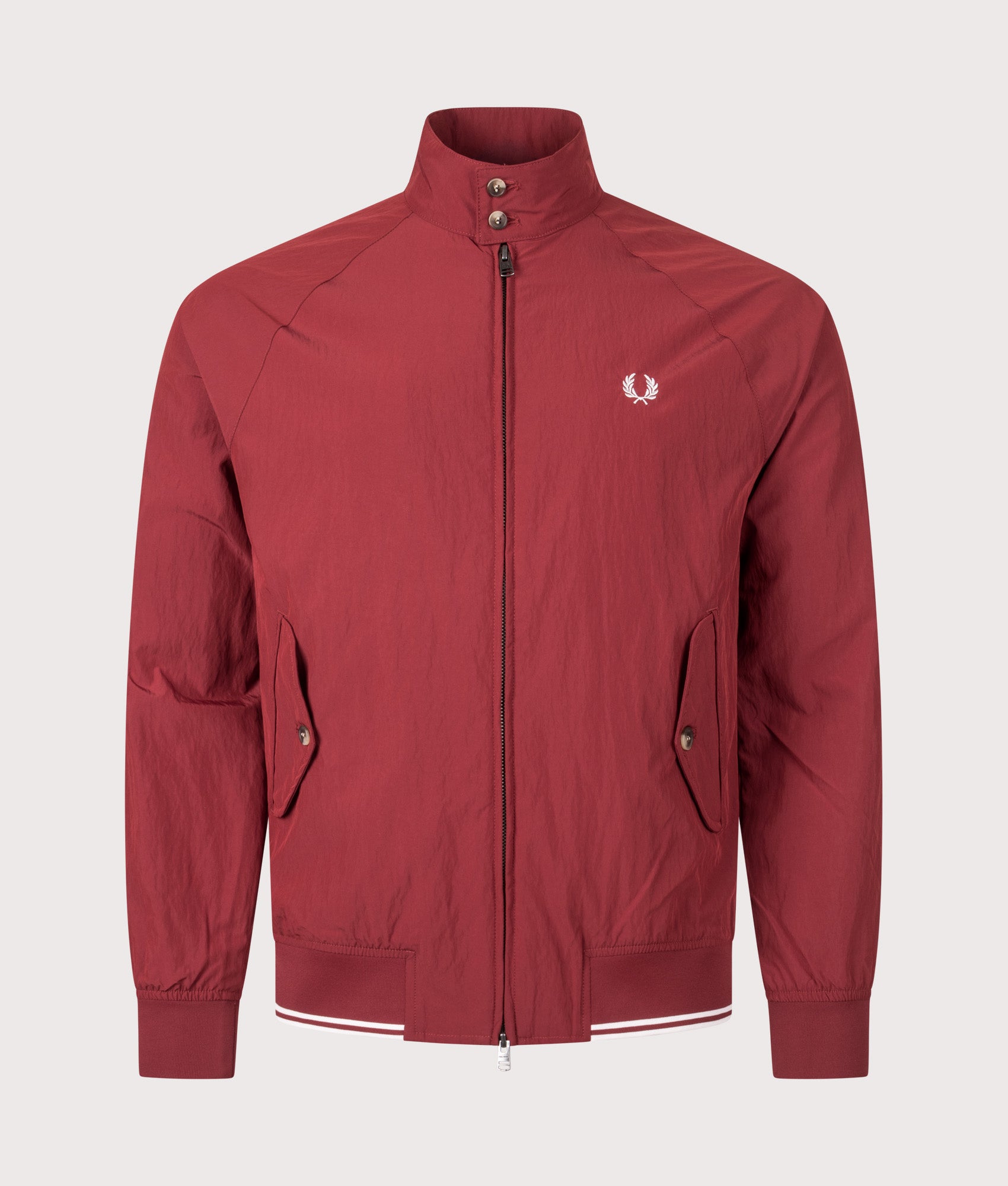 Fred Perry Crinkle Harrington Jacket in Burnt Red at EQVVS Menswear. Front shot.