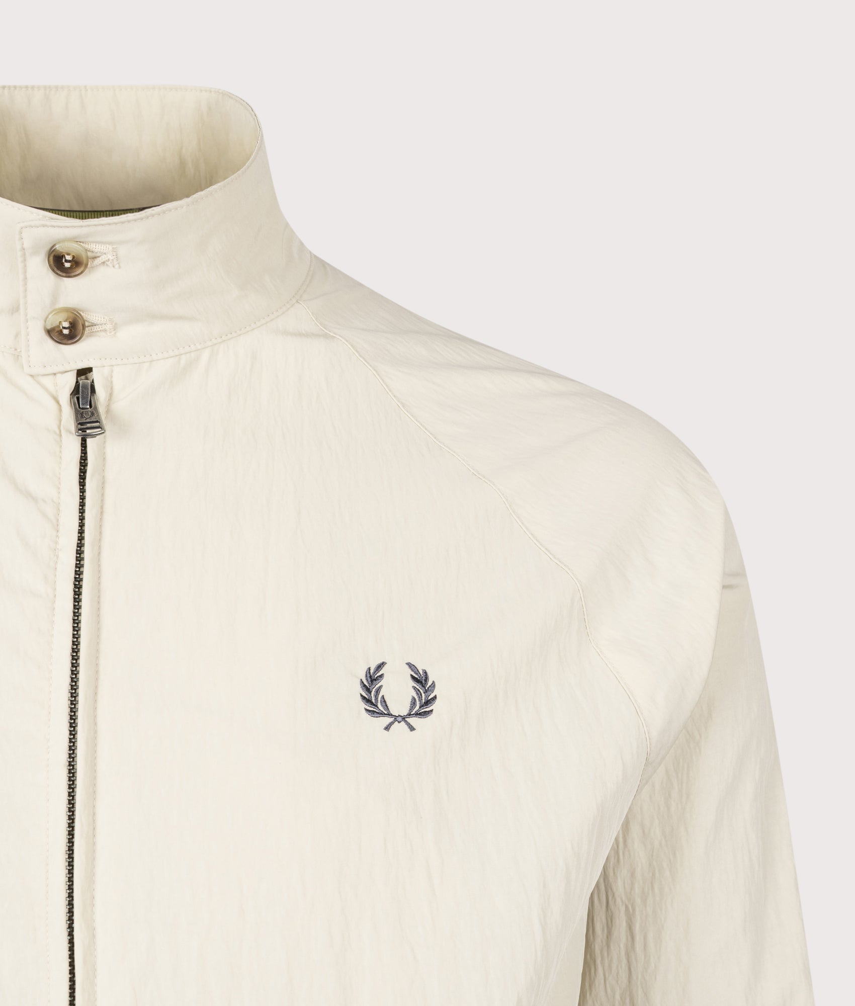 Fred Perry Crinkle Harrington Jacket in  Oatmeal at EQVVS Menswear. Detail shot.
