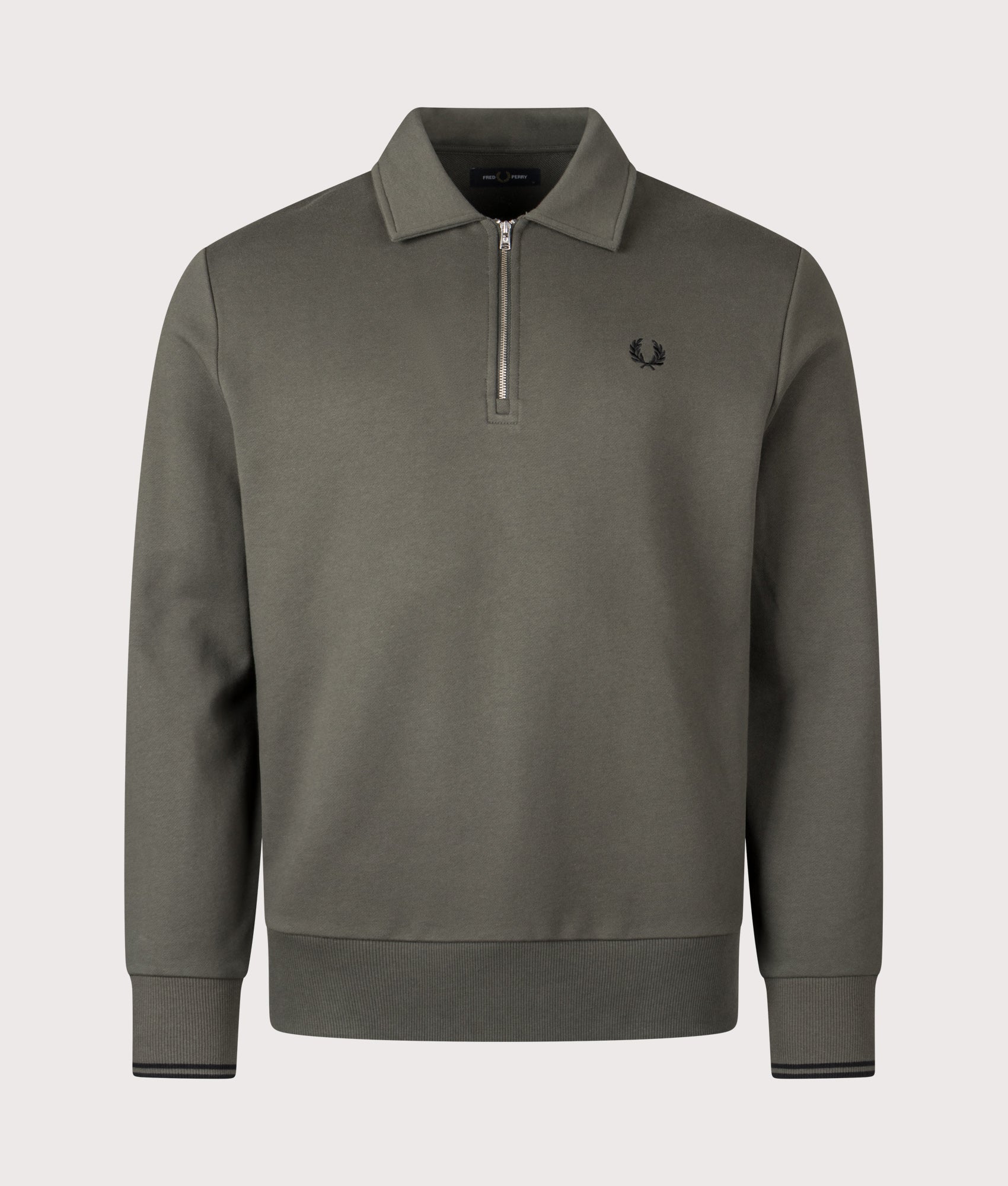 Fred Perry Quarter Zip Collared Sweatshirt in Field Green at EQVVS Menswear. Front shot.