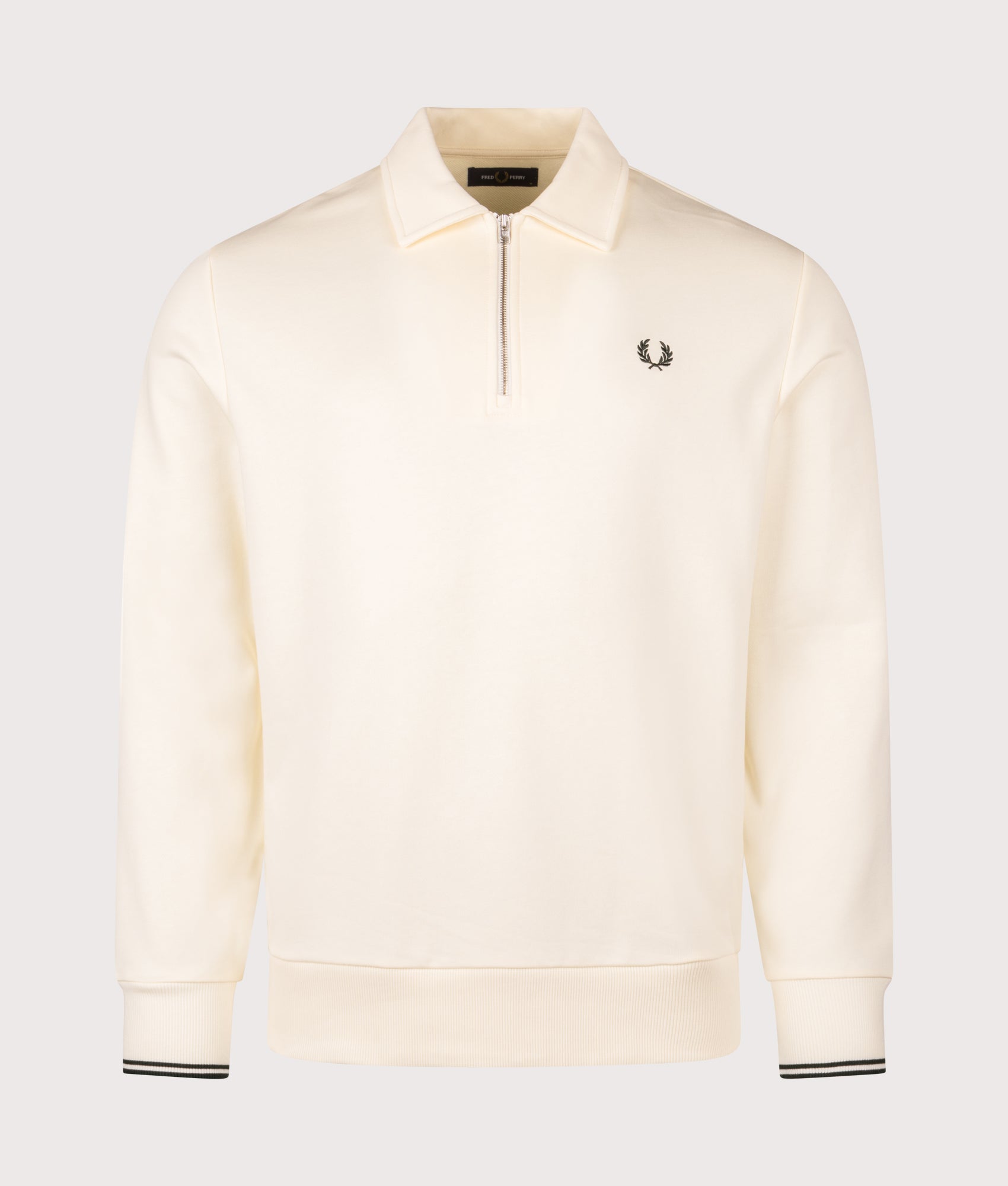 Fred Perry Quarter Zip Collared Sweatshirt in Ecru at EQVVS Menswear. Front shot.