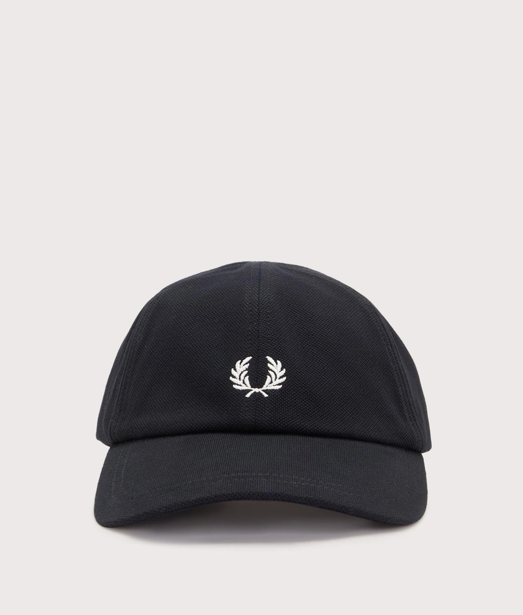 Fred Perry Piqué Classic Cap in Black and Snow White at EQVVS Menswear. Front shot.