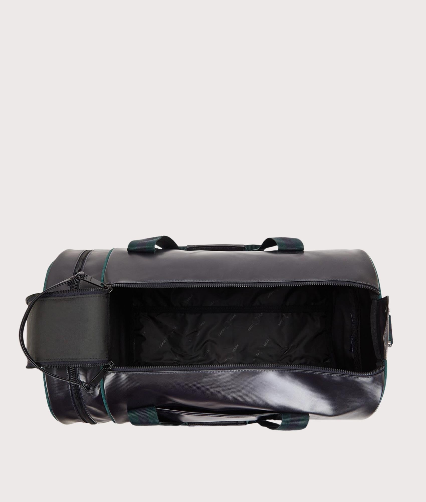 Fred Perry Classic Barrel Bag in Navy and Grassroots at EQVVS Menswear. Open shot.