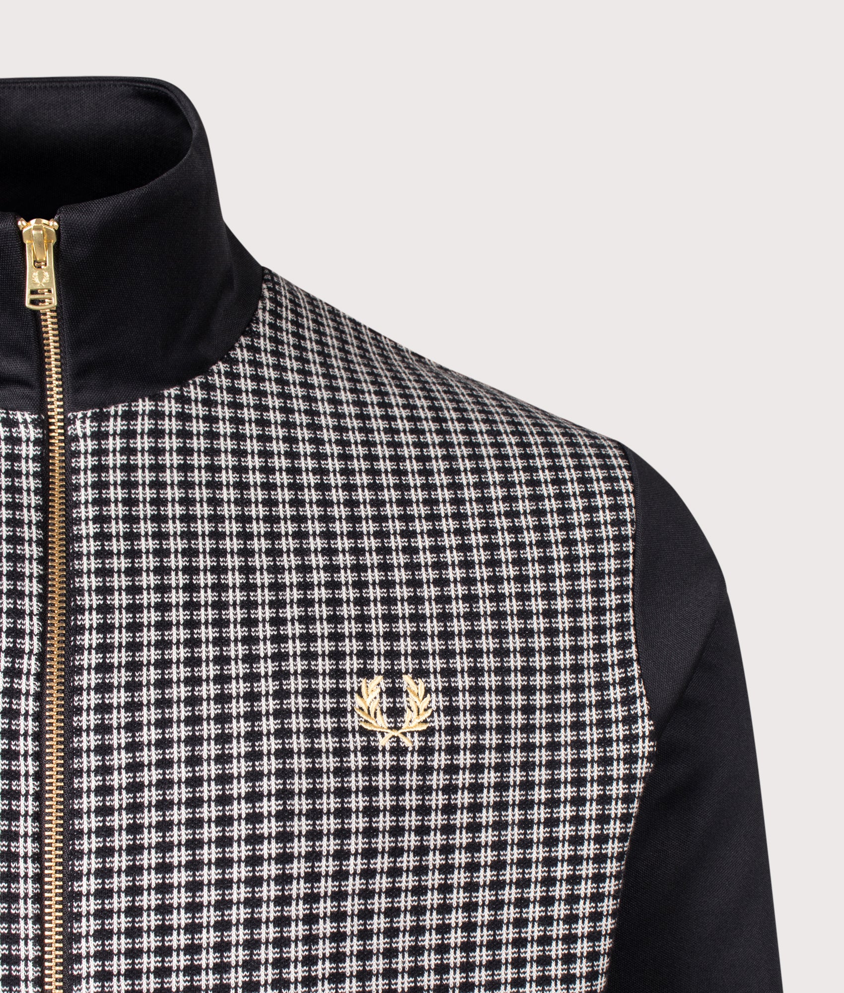 Fred Perry Knitted Front Track Jacket in Black at EQVVS Menswear. Detail shot.