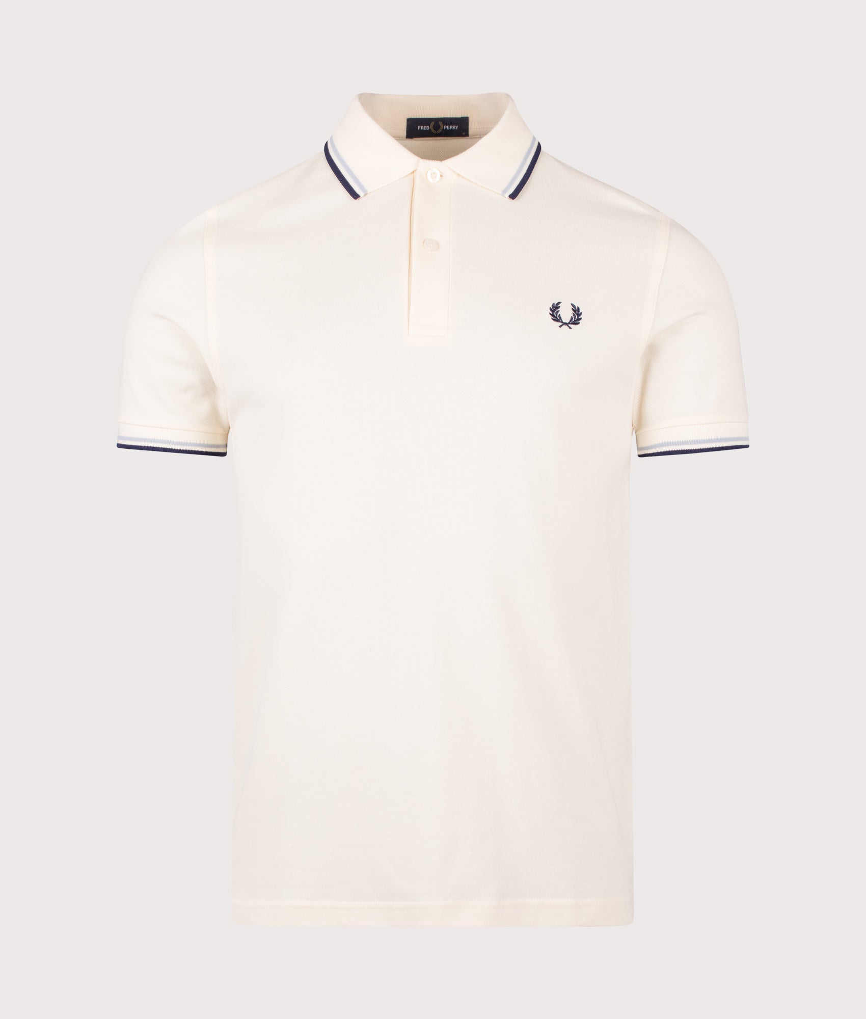 Fred Perry Twin Tipped Polo Shirt in Ecru, Dusky Blue and French Navy at EQVVS Menswear. Front shot.