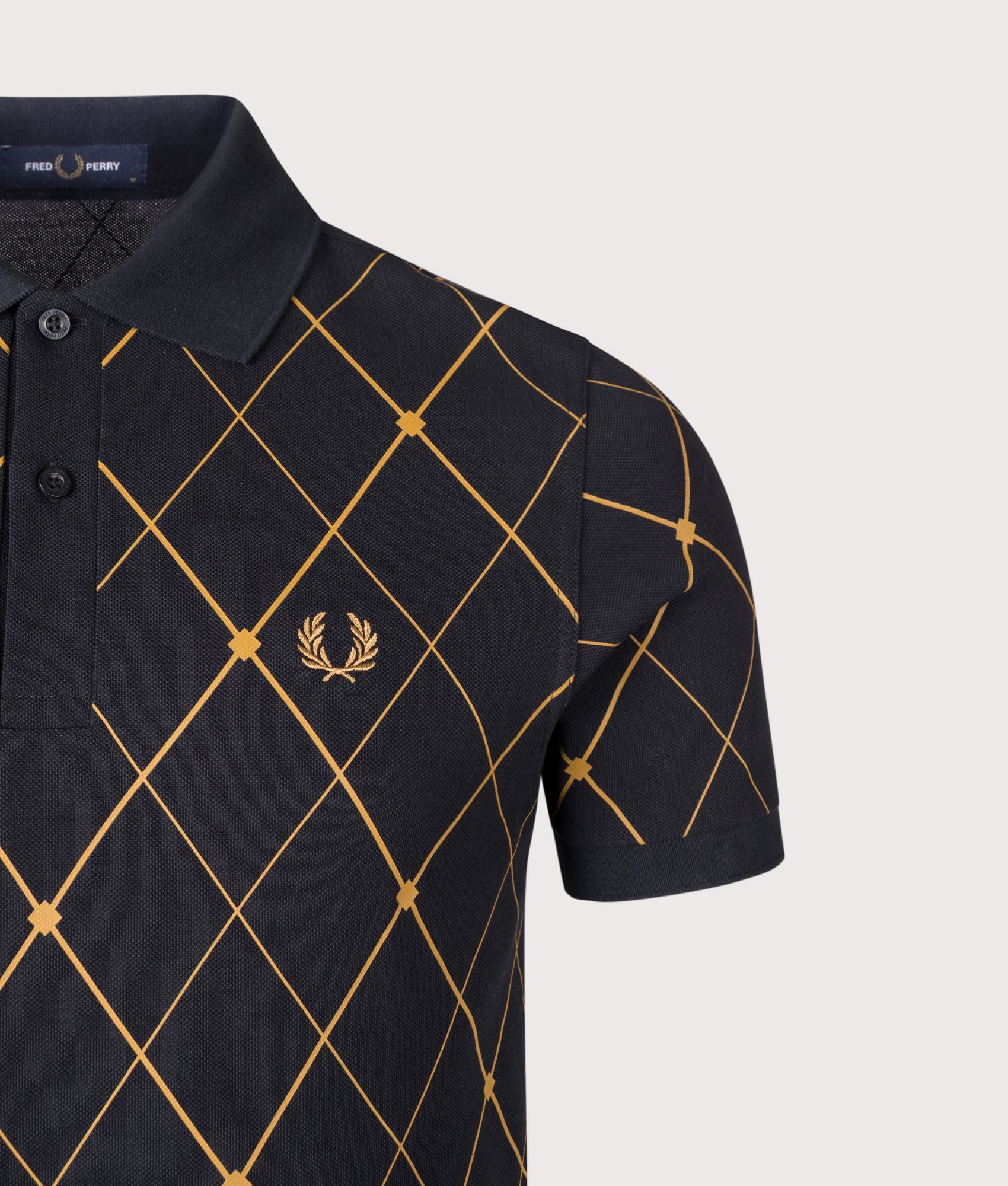 Fred Perry Argyle Print Fred Perry Shirt in Black at EQVVS Menswear. Detail shot.