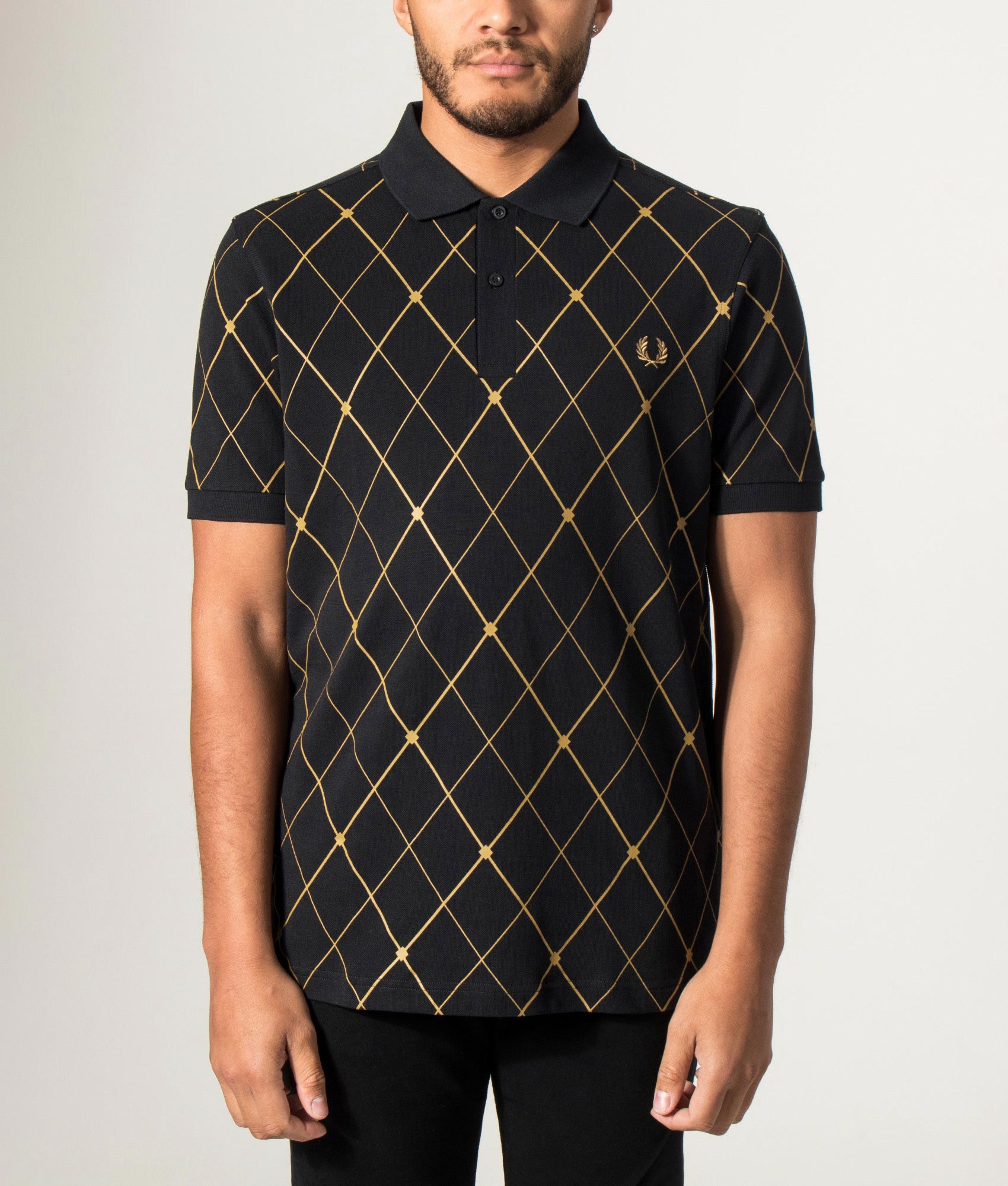 Fred Perry Argyle Print Fred Perry Shirt in Black at EQVVS Menswear. Model front shot.