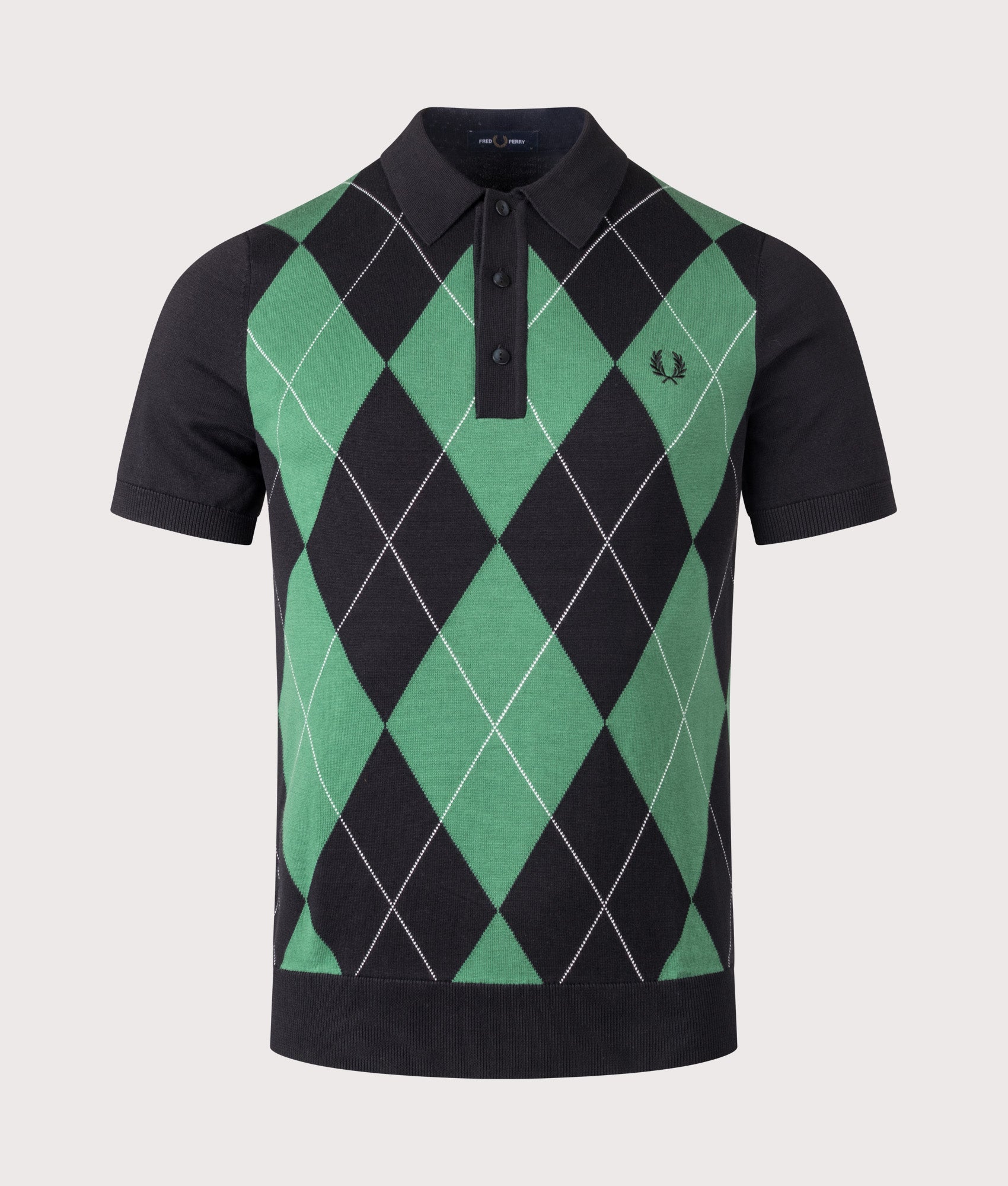 Fred Perry Argyle Knitted Polo Shirt in Black at EQVVS Menswear. Front shot.