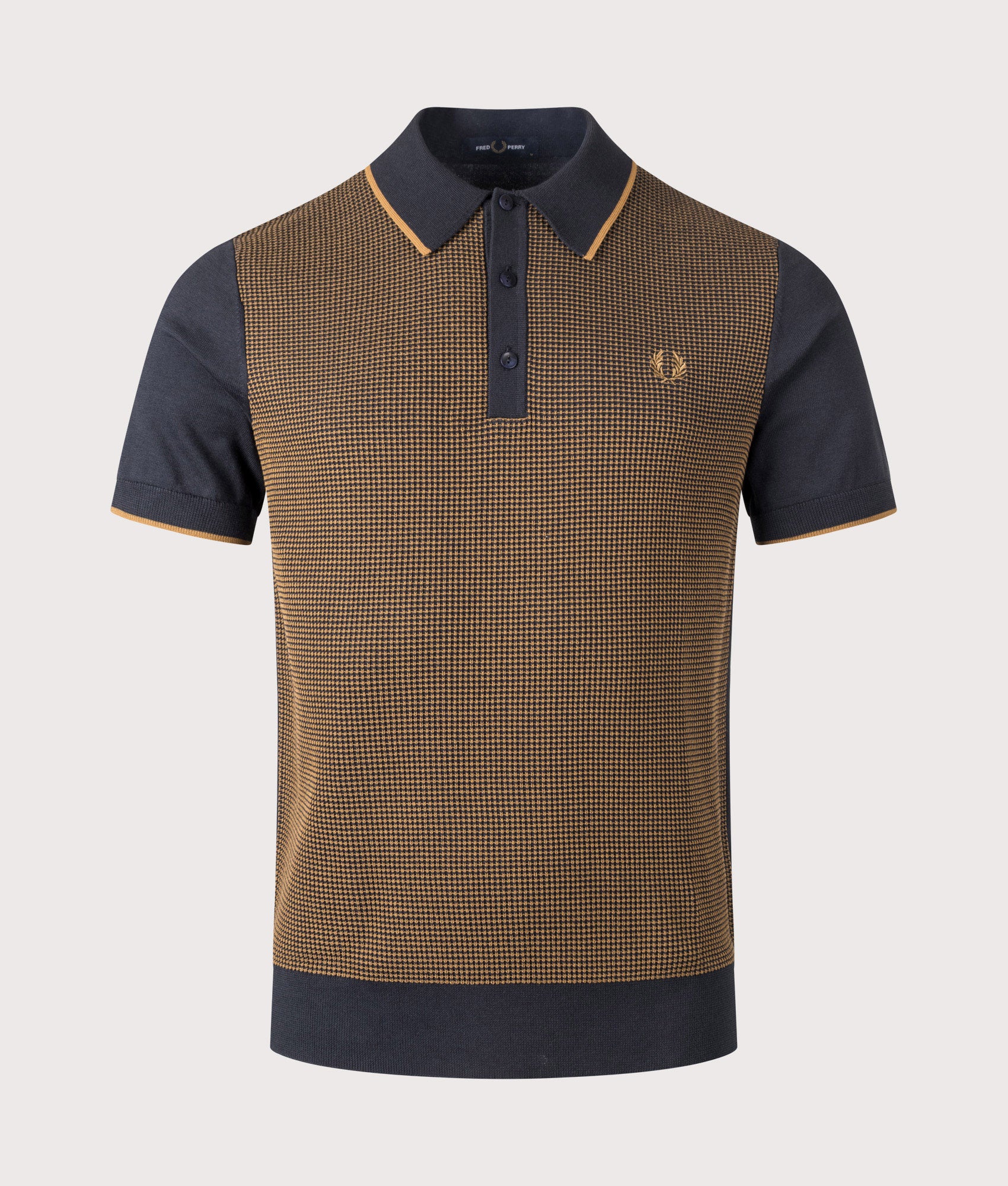 Fred Perry Tonic Waffle Knitted Polo Shirt in Navy at EQVVS Menswear. Front shot.