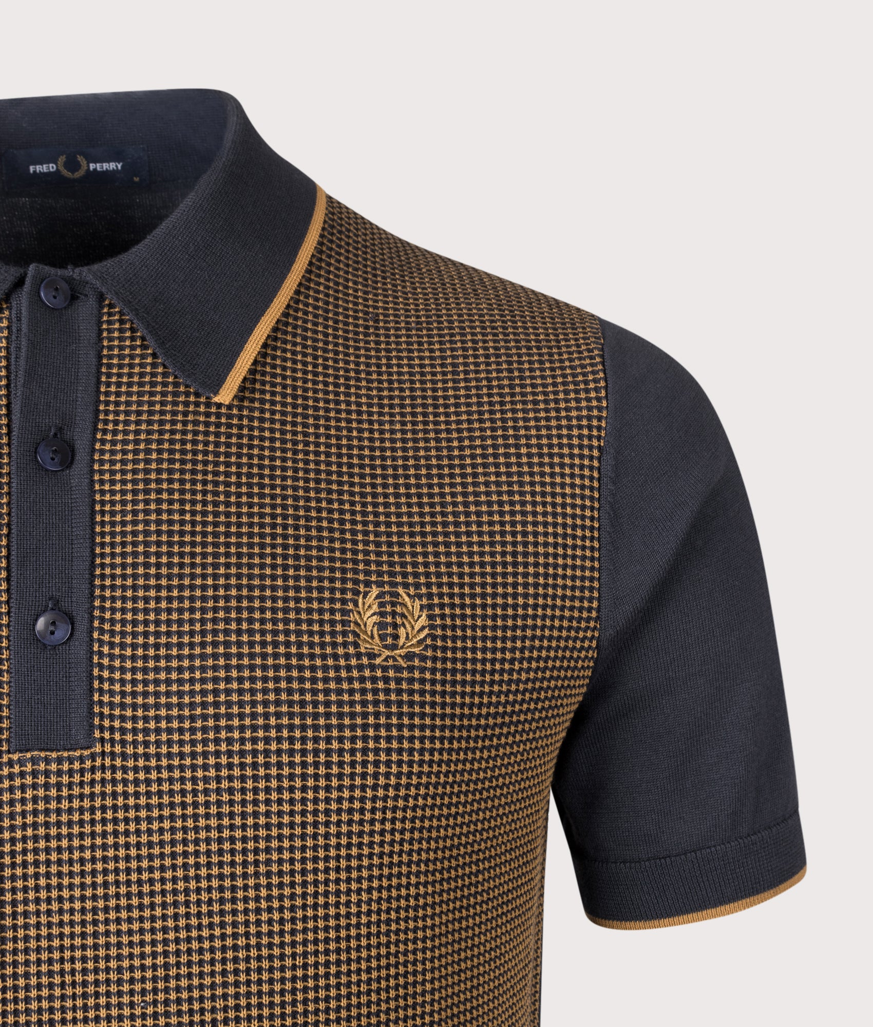 Fred Perry Tonic Waffle Knitted Polo Shirt in Navy at EQVVS Menswear. Detail shot.
