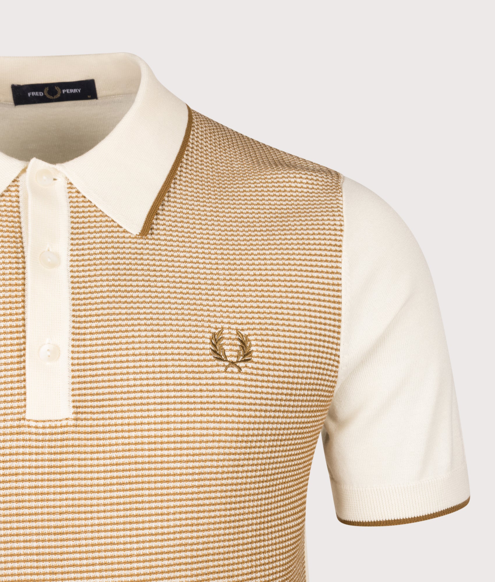 Fred Perry Tonic Waffle Knitted Polo Shirt in Ecru at EQVVS Menswear. Detail shot. 