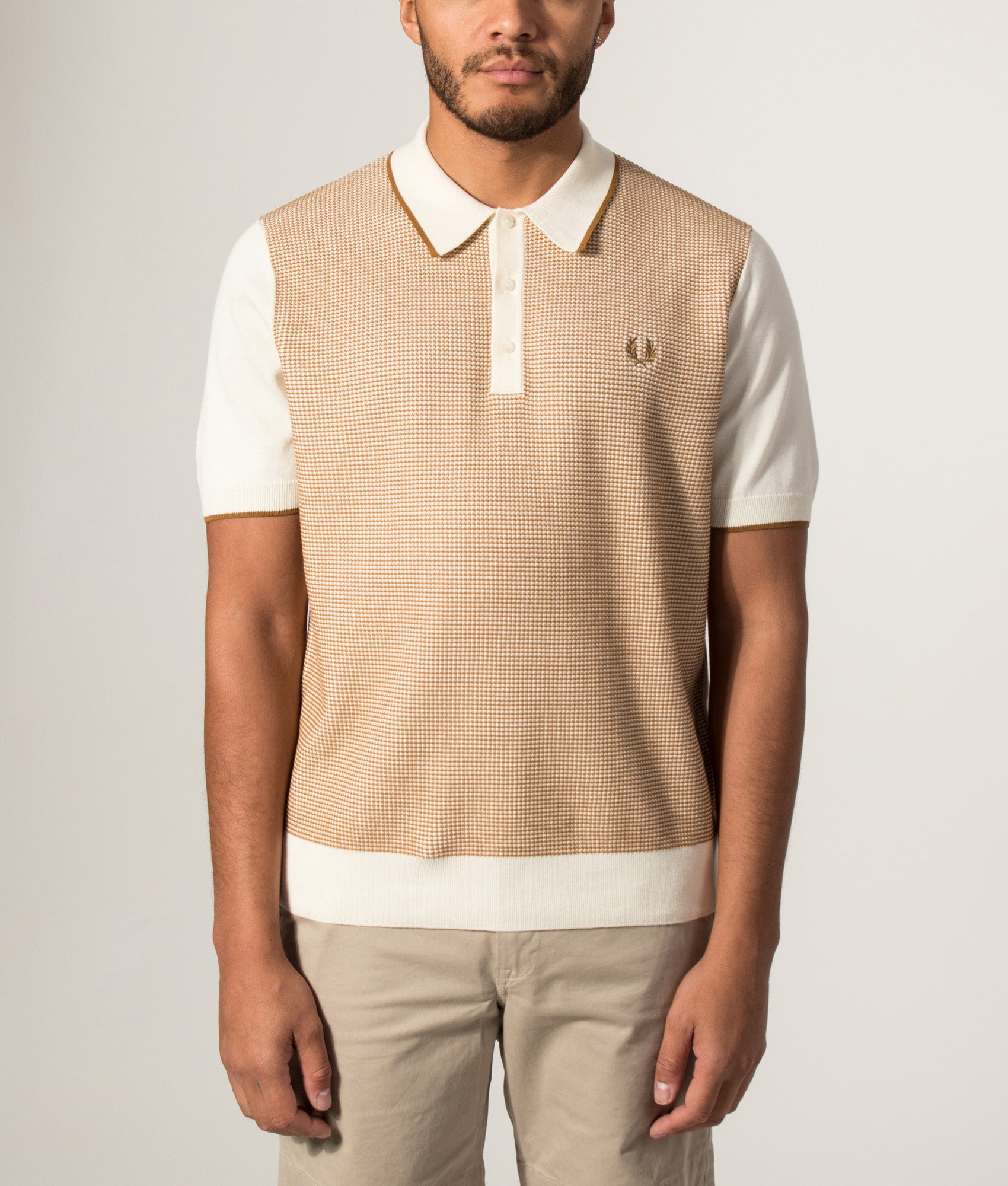 Fred Perry Tonic Waffle Knitted Polo Shirt in Ecru at EQVVS Menswear. Model front shot.