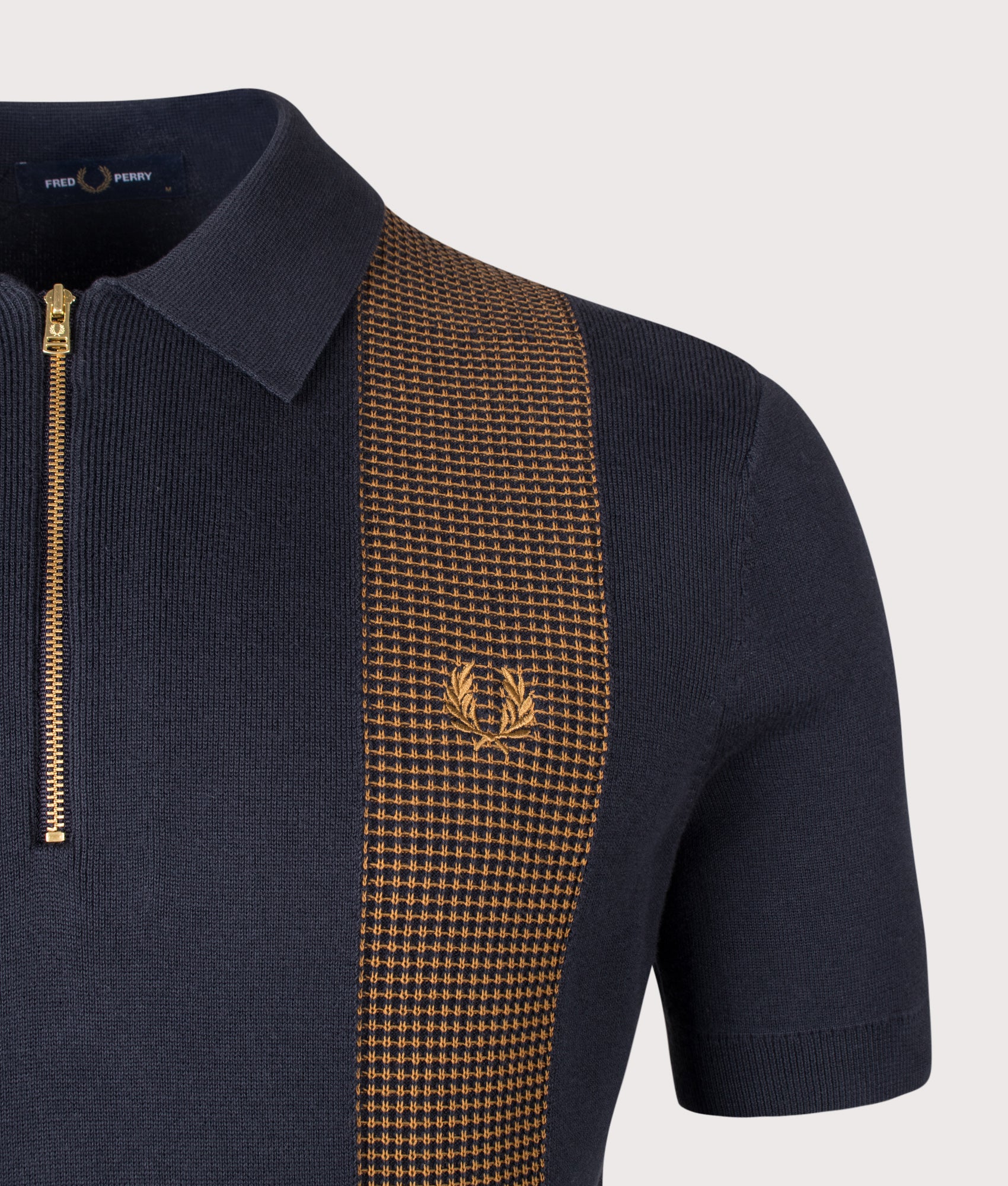 Fred Perry Panel Detail Knitted Polo Shirt in Navy at EQVVS Menswear. Detail shot.