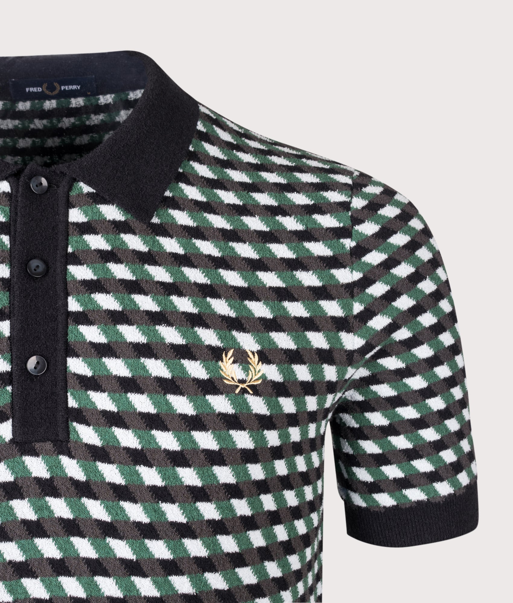 Fred Perry Geometric Knitted Polo Shirt in Light ice at EQVVS Menswear. Detail shot.