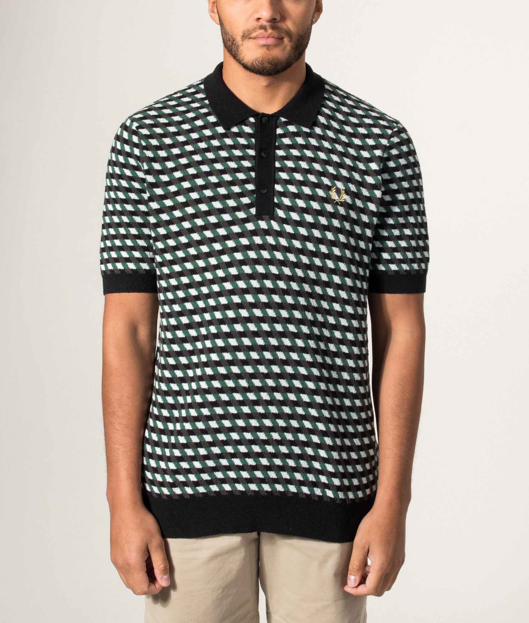 Fred Perry Geometric Knitted Polo Shirt in Light ice at EQVVS Menswear. Model front shot.