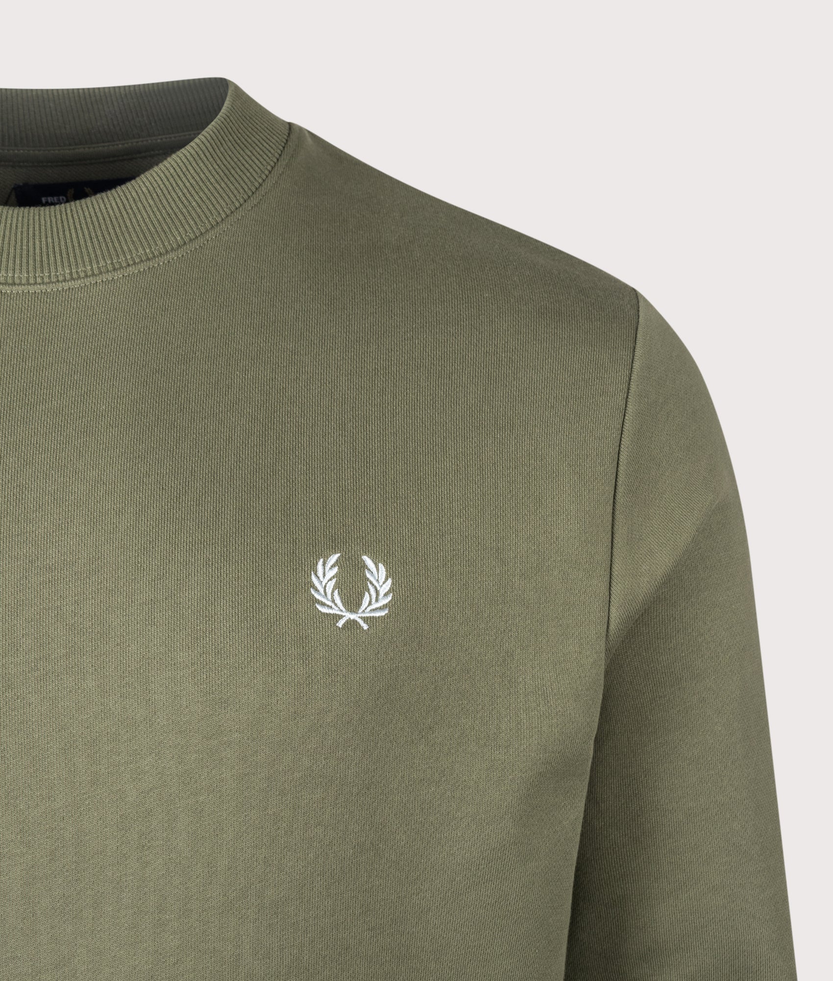 Fred Perry Crew Neck Sweatshirt in Laurel Wreath Green, Ecru and Dusky Blue at EQVVS Menswear. Detail shot.
