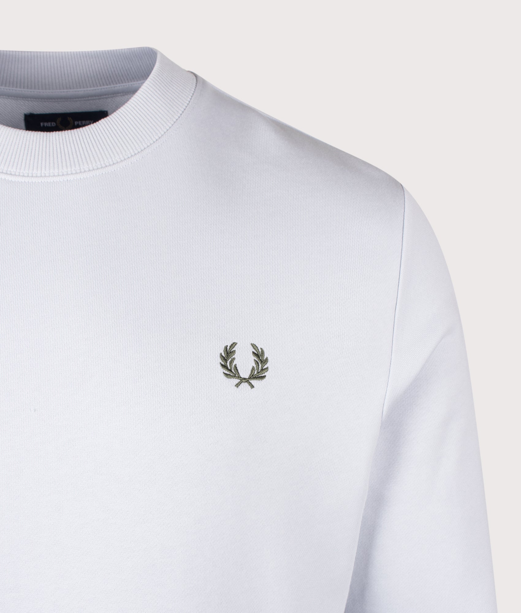 Fred Perry Crew Neck Sweatshirt in Dusky Blue, Ecru and Laurel Wreath Green at EQVVS Menswear. Detail shot.