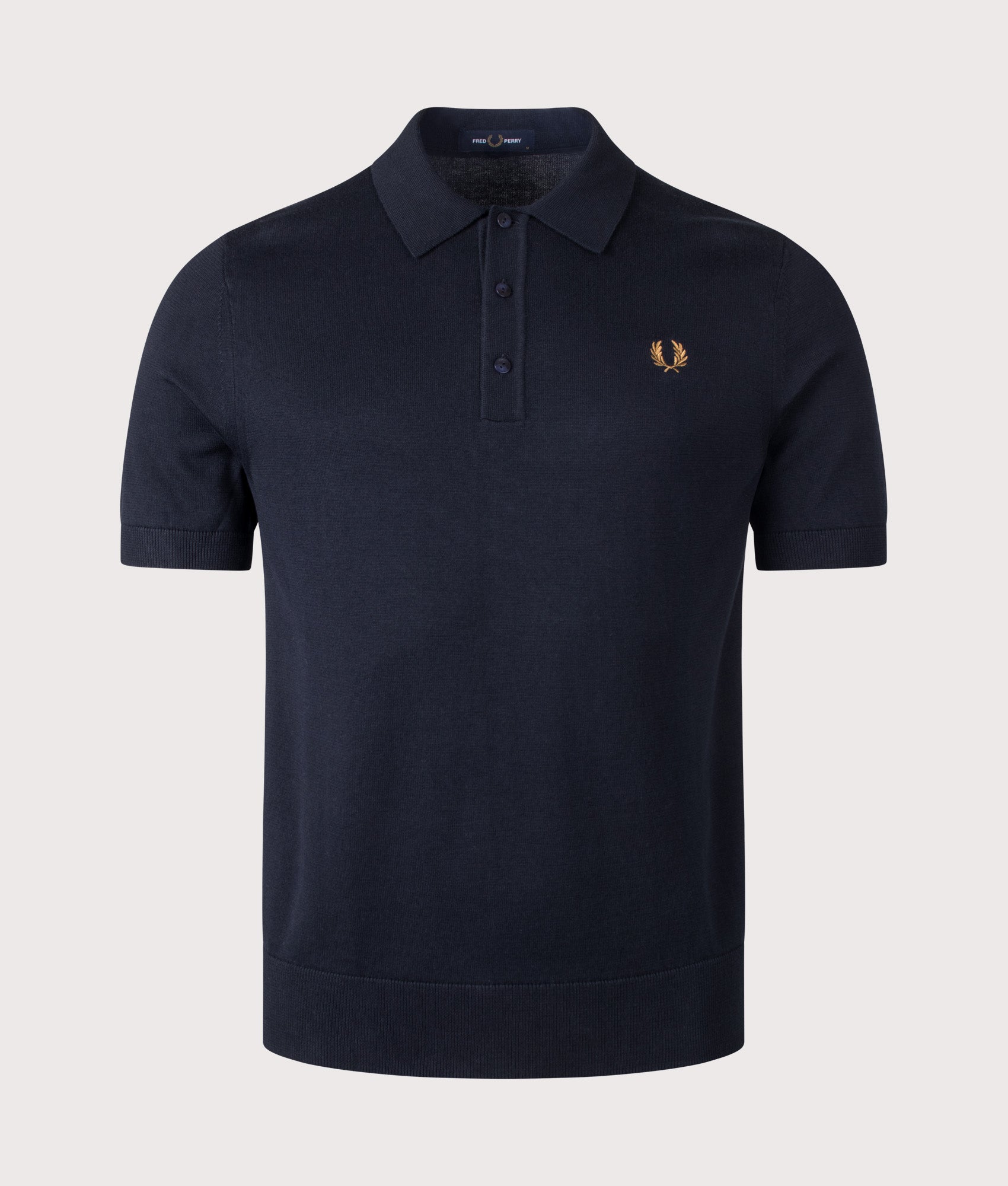 Fred Perry Long Staple Cotton Knitted Polo Shirt in Navy at EQVVS Menswear. Front shot.