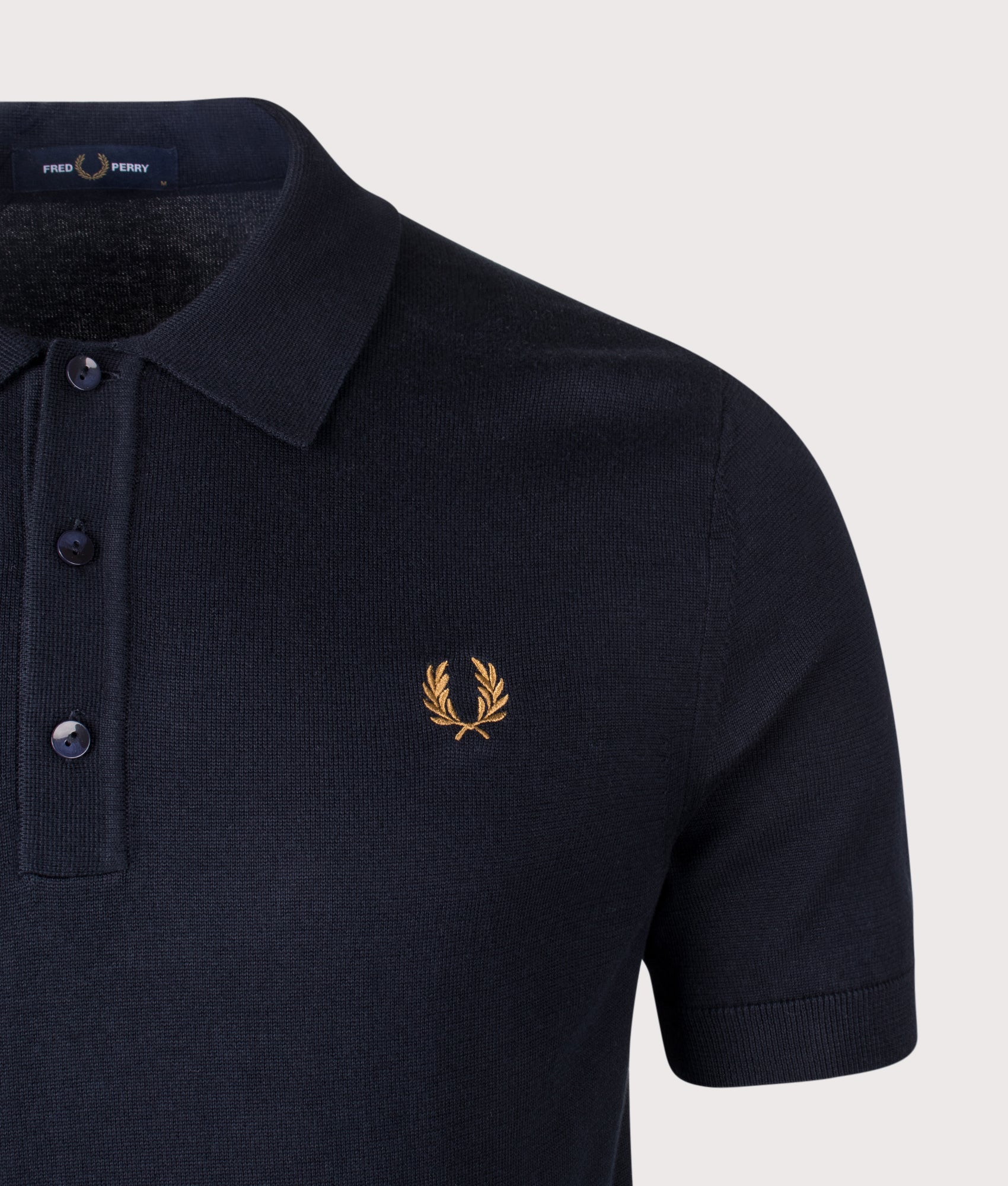 Fred Perry Long Staple Cotton Knitted Polo Shirt in Navy at EQVVS Menswear. Detail shot.