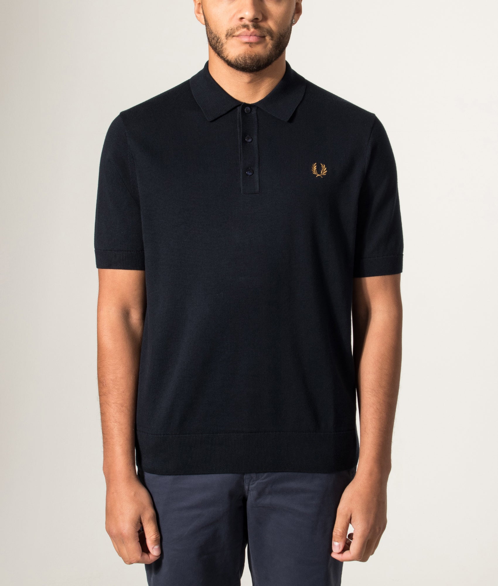 Fred Perry Long Staple Cotton Knitted Polo Shirt in Navy at EQVVS Menswear. Model front shot.