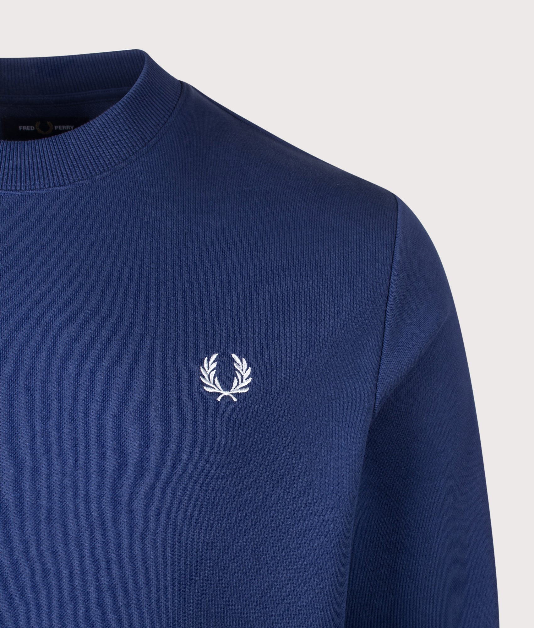 Fred Perry Crew Neck Sweatshirt in French Navy and Dusky Blue at EQVVS Menswear. Detail shot.