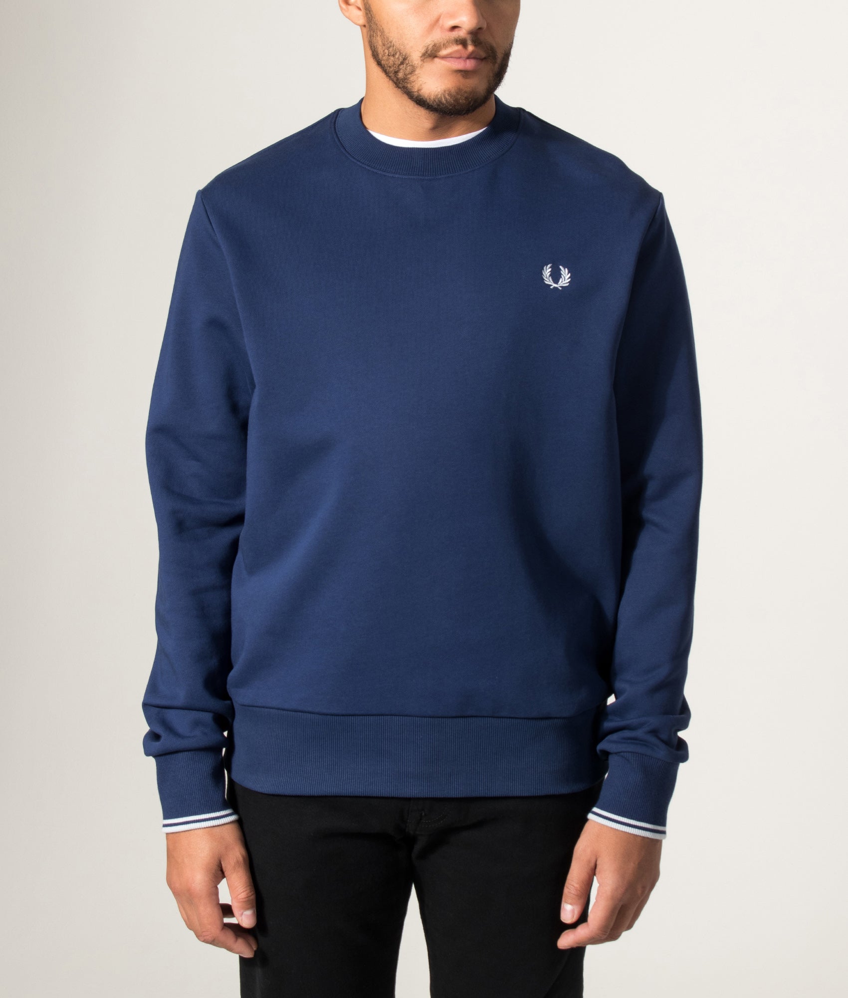 Fred Perry Crew Neck Sweatshirt in French Navy and Dusky Blue at EQVVS Menswear. Model front shot.