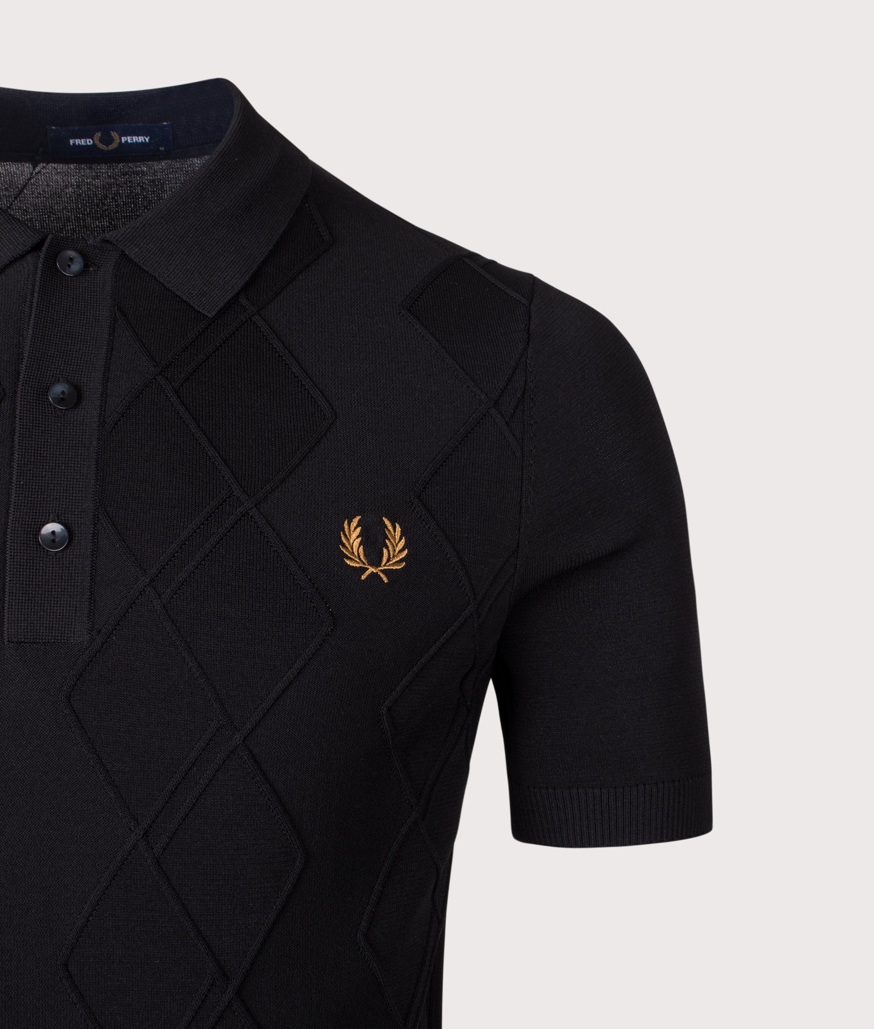 Fred Perry Cable Knitted Shirt in Black at EQVVS Menswear. Detail shot.