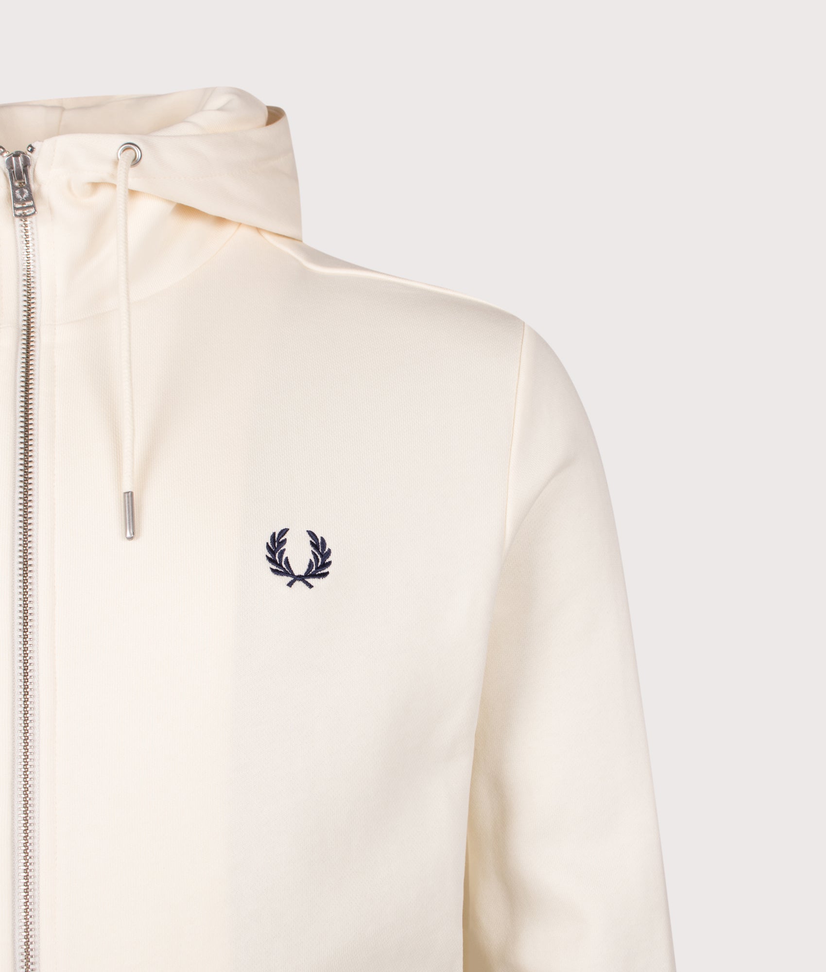 Fred Perry Zip Through Hoodie in Ecru, Dusky Blue and French Navy at EQVVS Menswear. Detail shot.