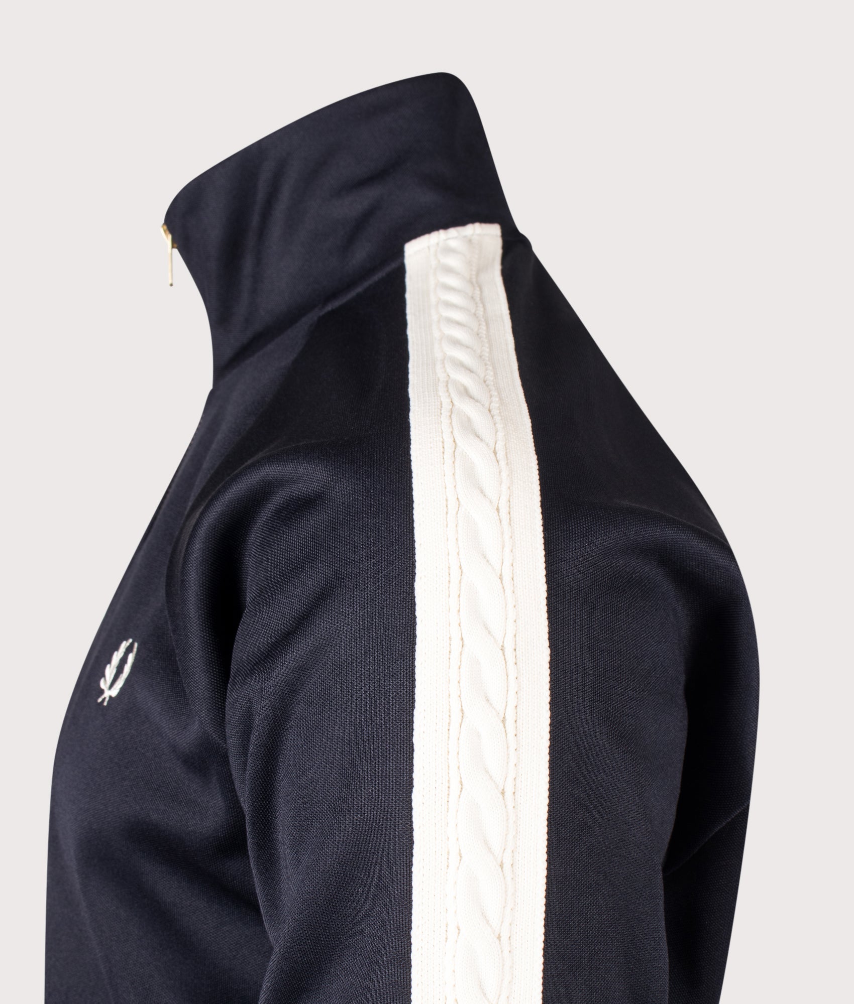 Fred Perry Cable Taped Track Jacket in Navy at EQVVS Menswear. Detail shot.
