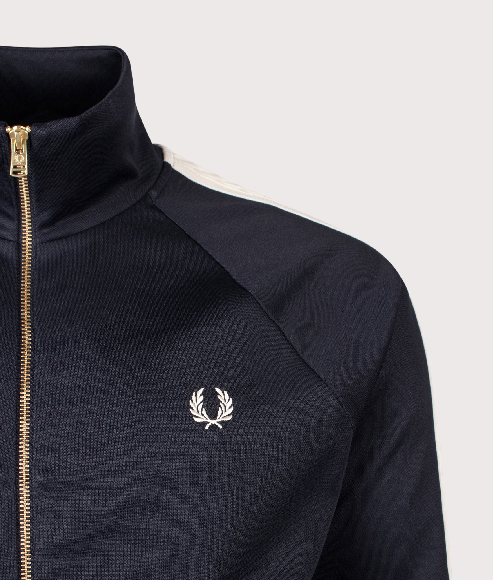 Fred Perry Cable Taped Track Jacket in Navy at EQVVS Menswear. Second detail shot.