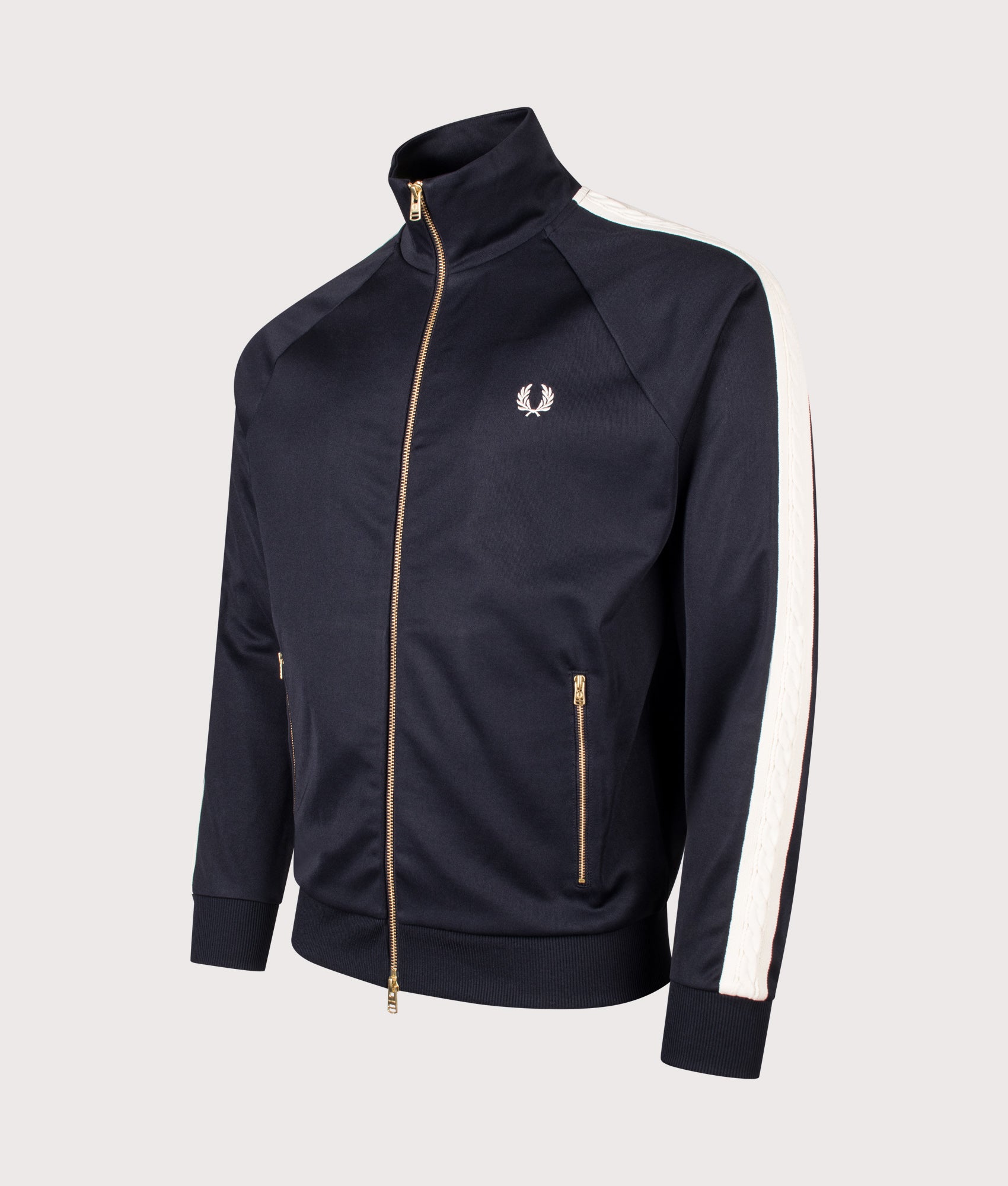 Fred Perry Cable Taped Track Jacket in Navy at EQVVS Menswear. Angled front shot.