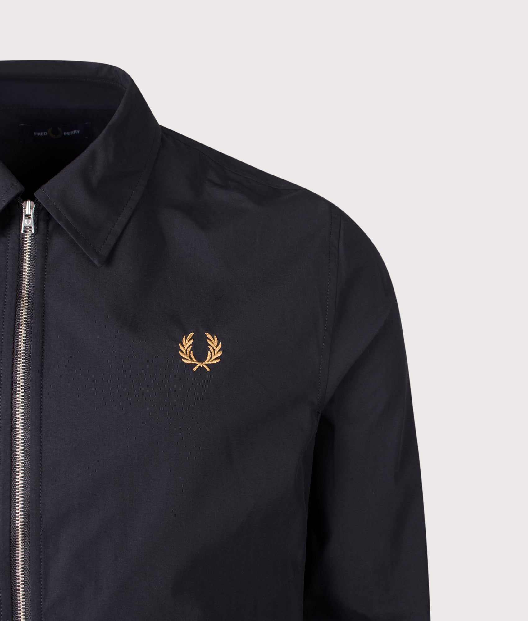 Fred Perry Poplin Overshirt in Black at EQVVS Menswear. Detail shot.