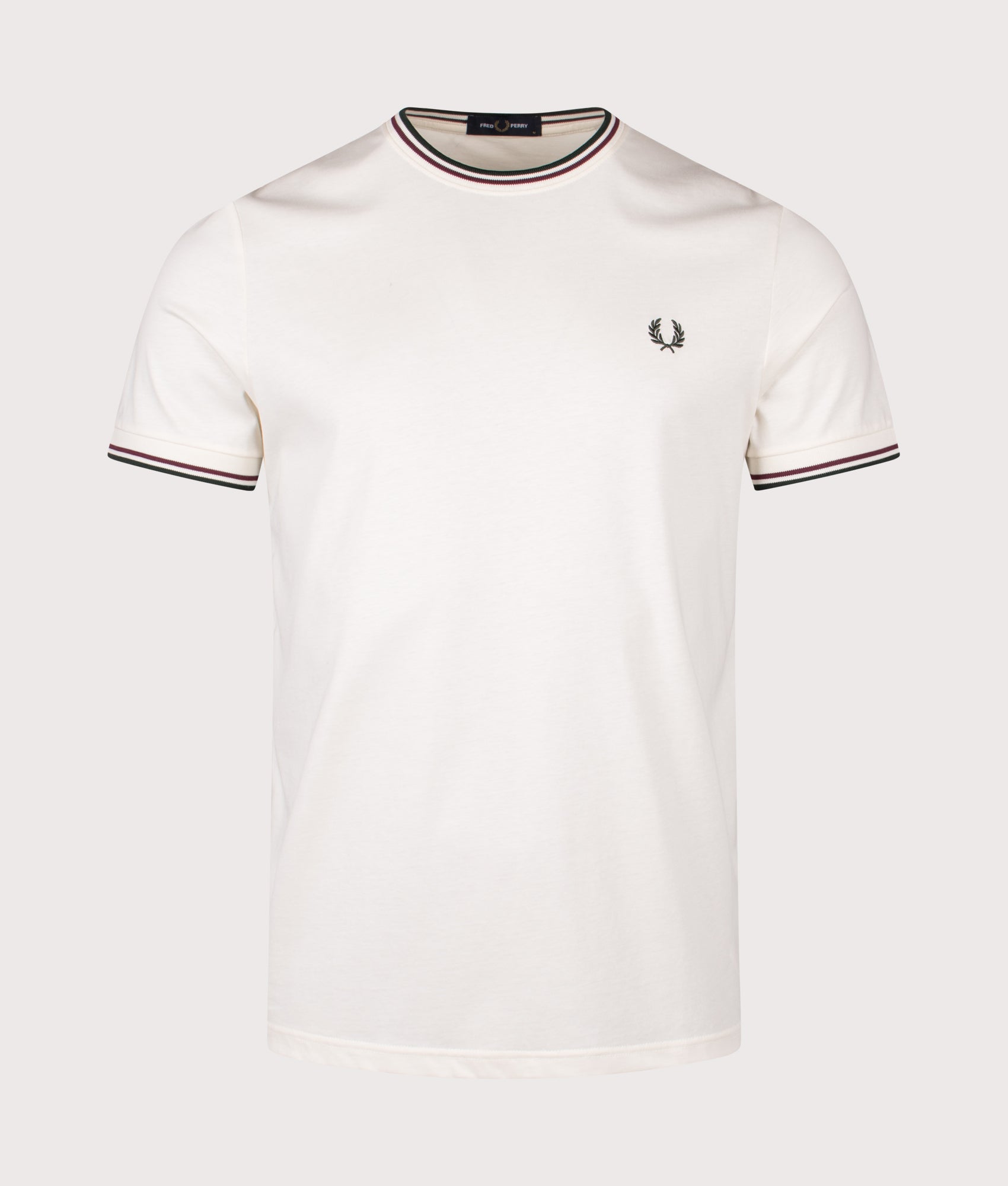 Fred Perry Twin Tipped T-shirt in Ecru, Oxblood and Grassroots at EQVVS Menswear. Front shot.