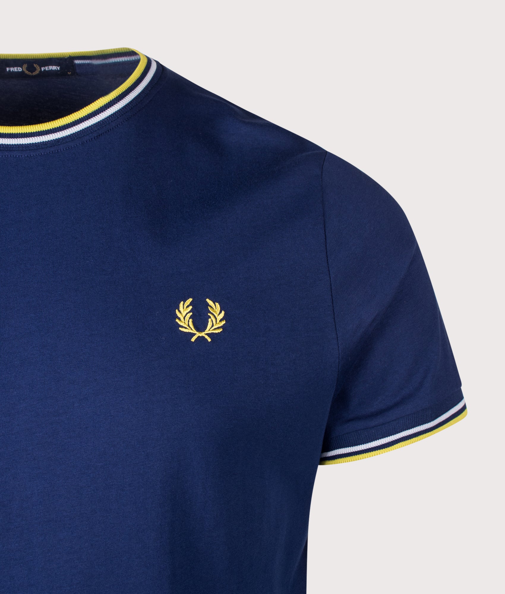 Fred Perry Twin Tipped T-Shirt in French Navy, Dusky Blue and Citron a EQVVS Menswear. Detail shot.