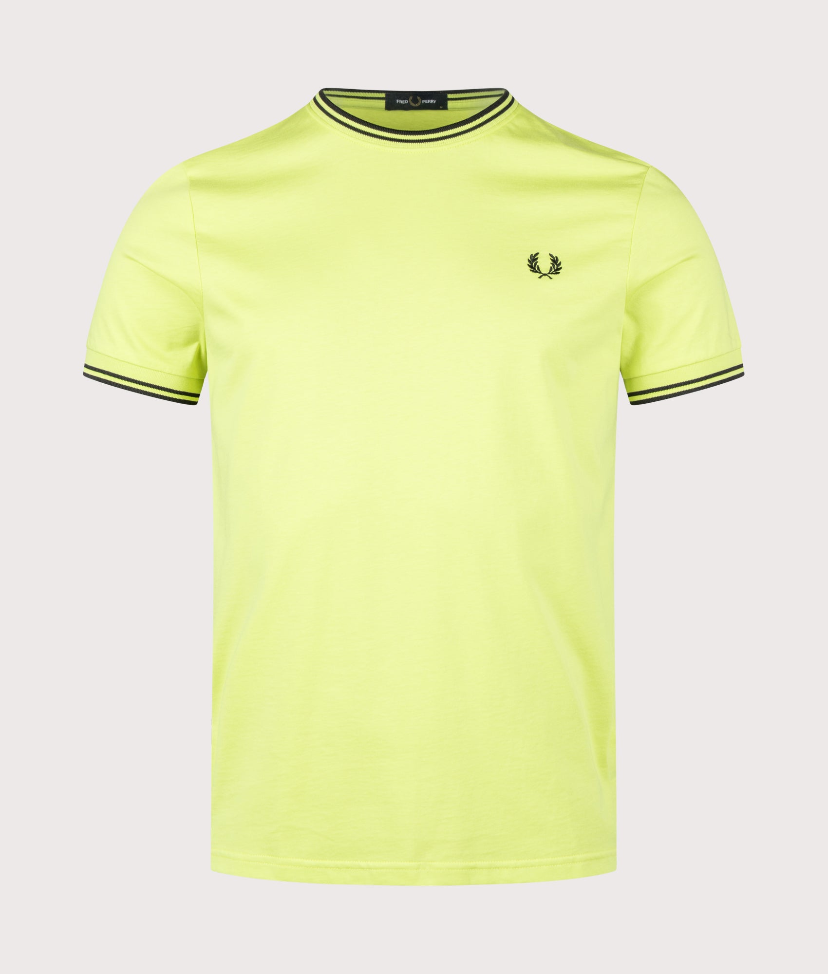 Fred Perry Twin Tipped T-Shirt in Citron and Black at EQVVS Menswear. Front shot.