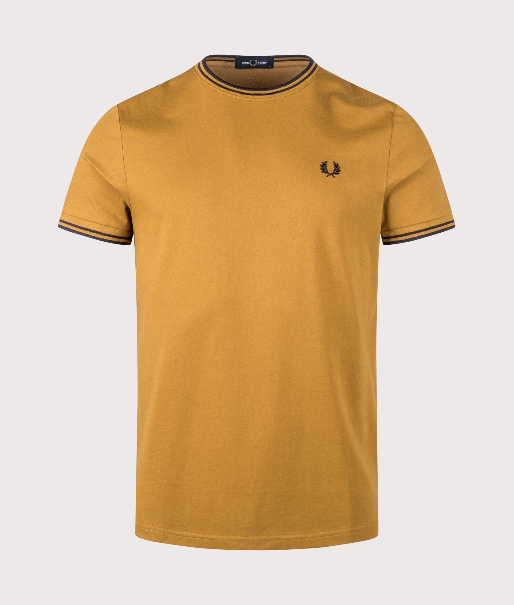 Fred Perry Twin Tipped T-Shirt in Dark Caramel and Navy at EQVVS Menswear. Front shot.