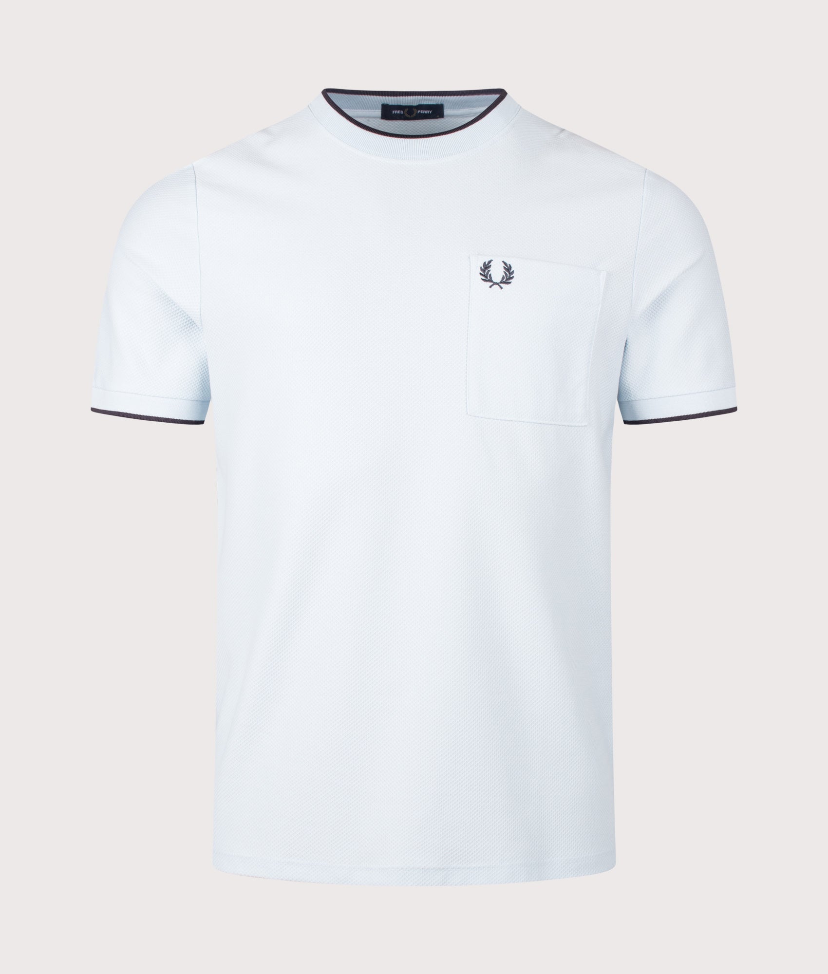 Fred Perry Pocket Detail Piqué T-Shirt in Light Ice at EQVVS Menswear. Front shot.