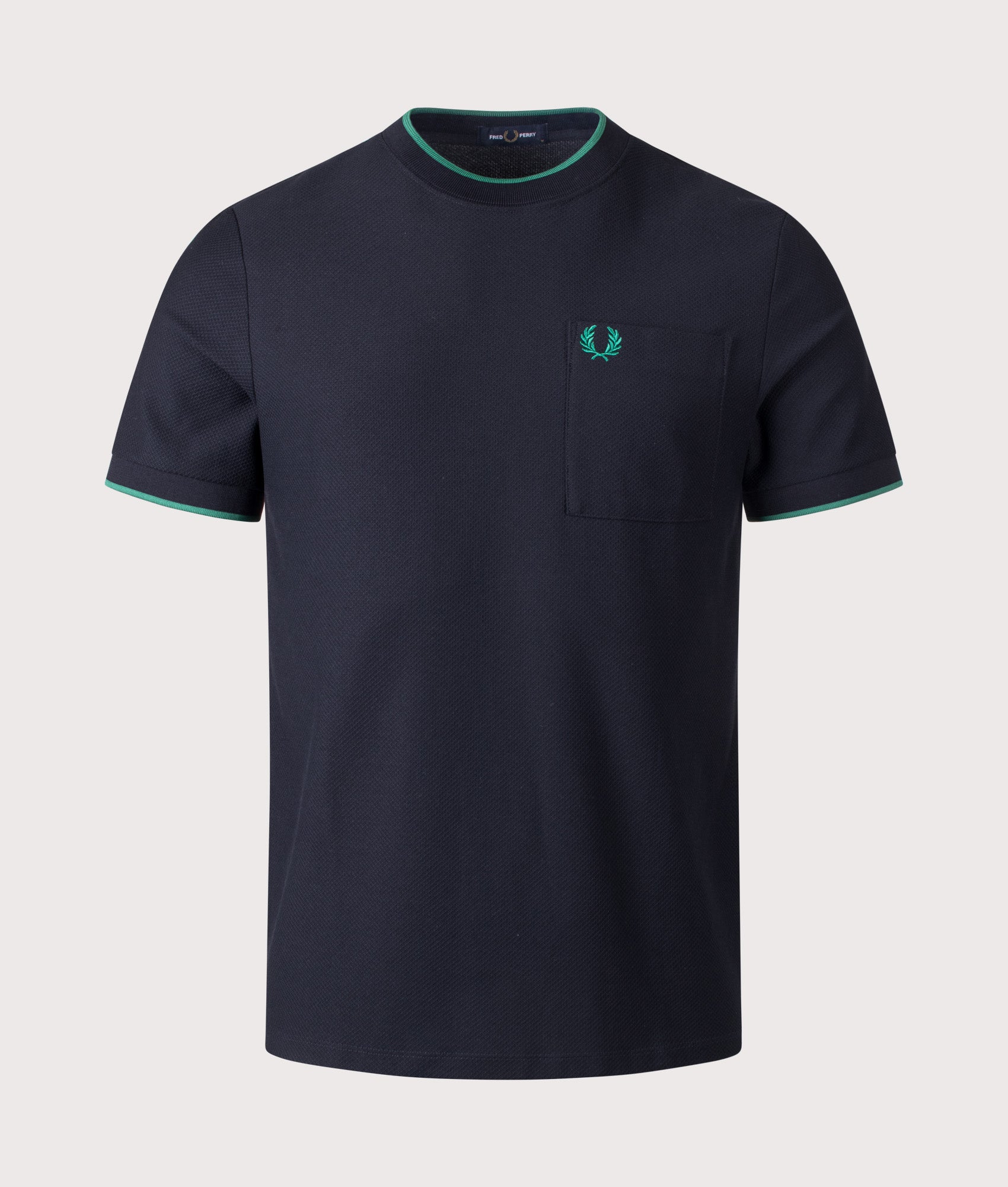 Fred Perry Pocket Detail Piqué T-Shirt in Navy at EQVVS Menswear. Front shot.