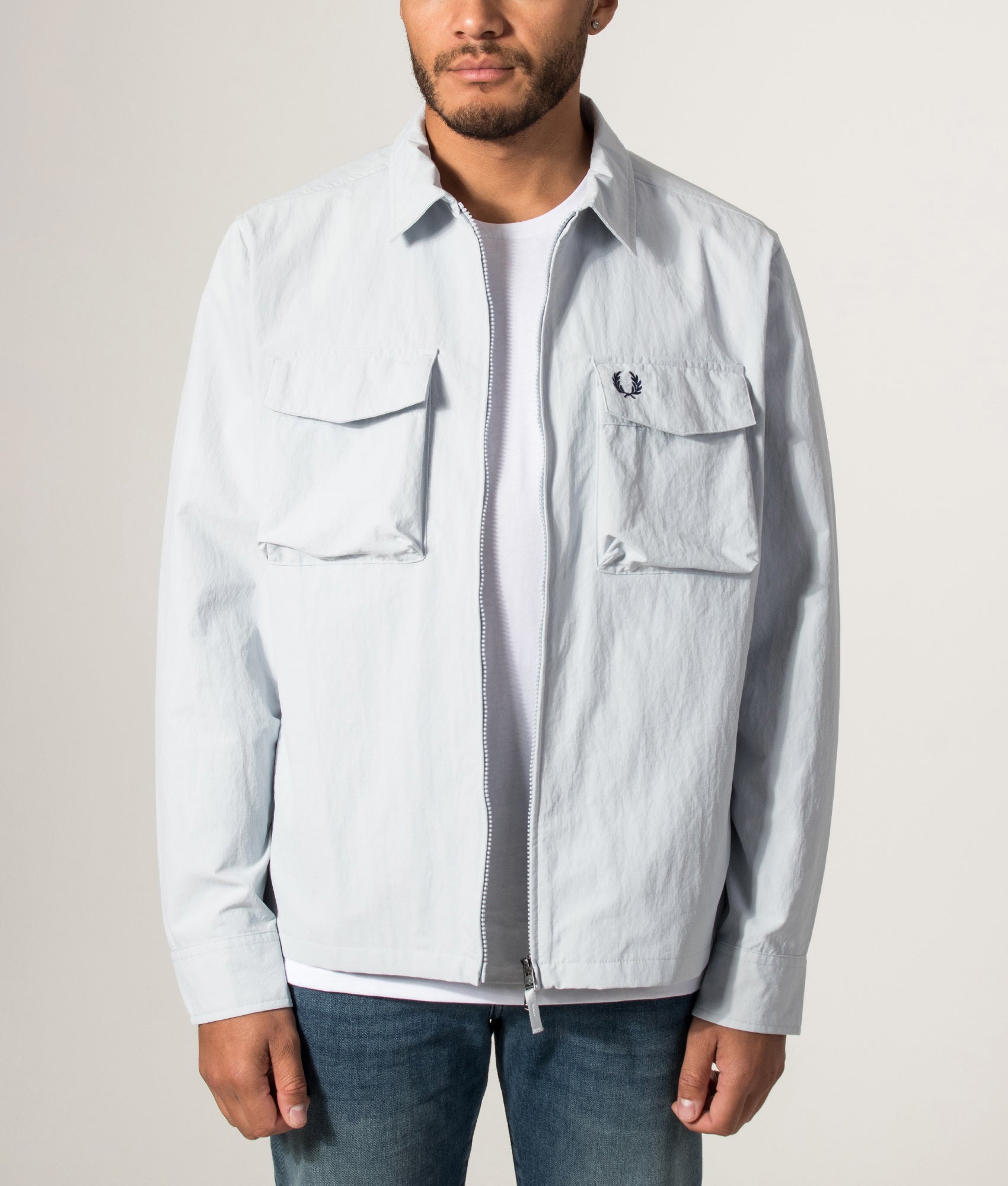 Fred Perry Ripstop Pocket Overshirt in Dusky Blue at EQVVS Menswear. Model front shot.