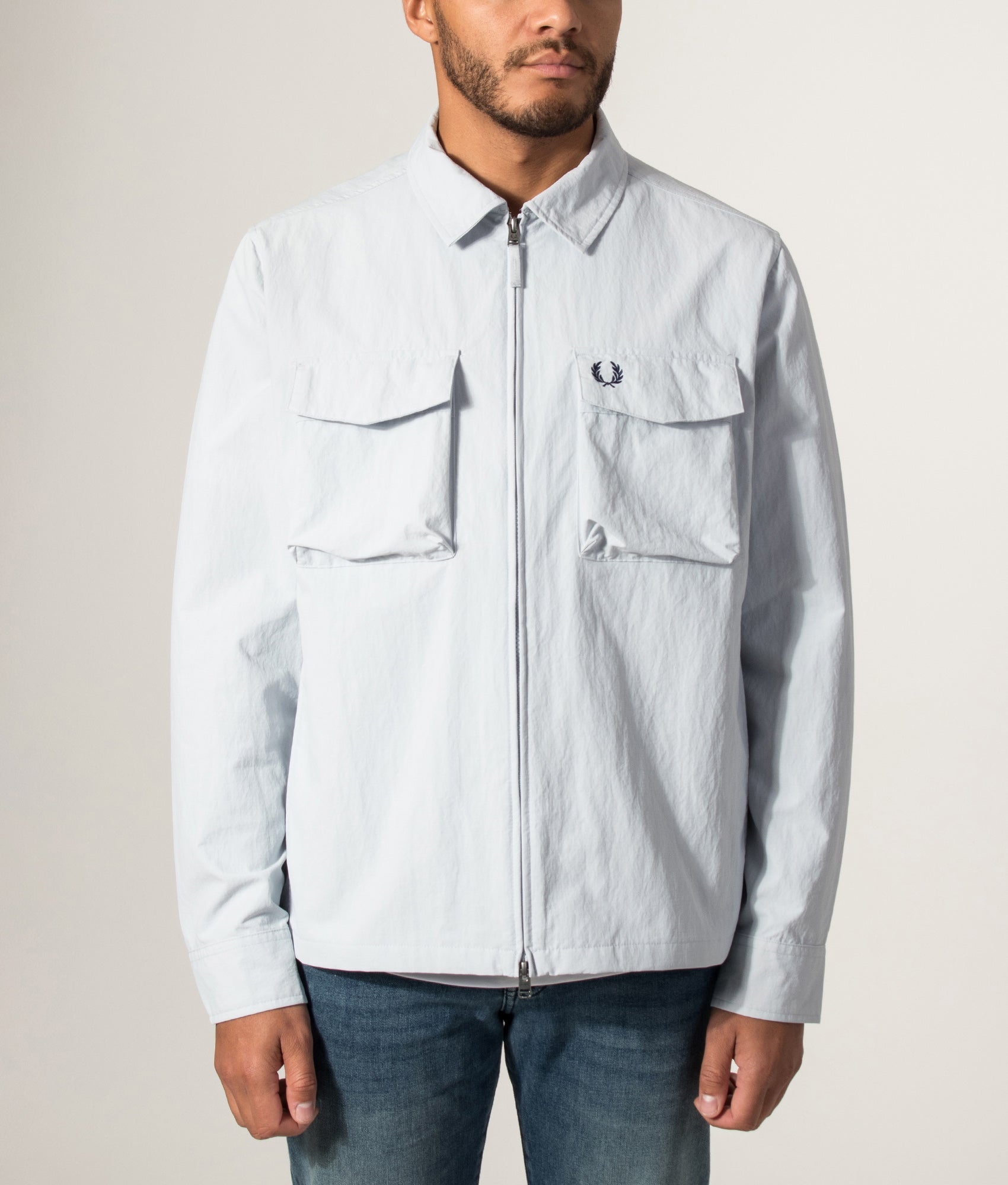Fred Perry Ripstop Pocket Overshirt in Dusky Blue at EQVVS Menswear. Model front shot.